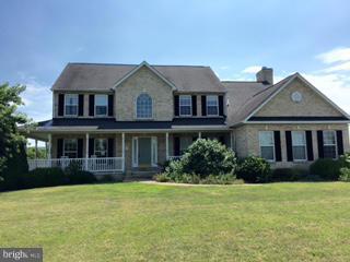 Gorgeous view abound around this wonderful all brick 2 story home with finished walk out basement, rear decking and inground pool. 8+ acres, 3 in grass, 5+ in woods surround this home. Engle Crossing is a small, large acreage community tucked between Harpers Ferry and Shepherdstown. 4Br, 4 1/2 bath. Room for everyone here! Appraised 6/16 for $525,000. Owners have priced below market! What a deal!