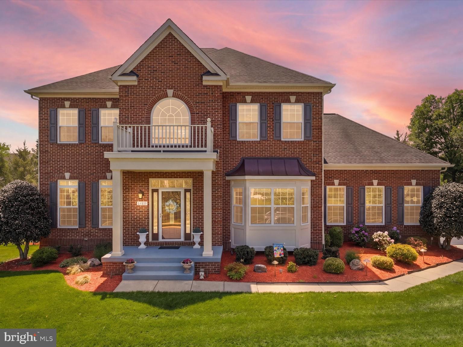 Welcome to one of Ashburn/Brambleton’s most sought-after offerings, where space, privacy, and refined everyday living come together effortlessly. Meticulously maintained and thoughtfully updated for comfort, convenience, and peace of mind, this exceptional residence features 4 bedrooms, a dedicated office/optional bedroom, 2 bonus rooms, 4.5 baths, and a spacious 3-car garage.

Perfectly positioned on a premium 0.39 acre lot backing to mature trees and a tranquil creek, the home offers a rare sense of privacy and serenity while remaining moments from everything Ashburn has to offer.

Step inside to a grand two story foyer with soaring vaulted ceilings, elegant formal living and dining spaces, and a sweeping curved staircase that creates an immediate sense of sophistication. Designed for both comfortable daily living and effortless entertaining, the home offers expansive living spaces, abundant natural light, and 10-foot ceilings throughout.

Upstairs, the luxurious owner’s suite is designed as a private retreat, complete with a sitting room separated by a dual-sided gas fireplace, spacious spa-like bath with soaking tub, and dual walk-in closets. The upper level also includes Jack-and-Jill bedrooms with adjoining bath, a generously sized laundry room with LG washer/dryer and utility sink, and a private guest en-suite ideal for extended family or visitors.

At the heart of the home, the chef’s kitchen seamlessly connects to the family room, creating a warm and inviting space where everyone naturally gathers. Thoughtfully designed for both entertaining and everyday functionality, the oversized island kitchen features granite countertops, stainless steel appliances, gas cook to, breakfast bar, bay-window breakfast room, walk-in pantry, glass mosaic tile backsplash, and abundant cabinetry. A butler’s pantry with mini fridge and additional dishwasher connects the kitchen and formal dining room, enhancing the home’s effortless flow for hosting.

The adjoining family room offers custom built-in bookshelves, a gas fireplace, and pre-wiring for surround sound, creating the perfect setting for relaxed evenings at home. Step outside to the covered screened-in porch and enjoy peaceful wooded views and the calming sounds of nature.

Just off the kitchen, the expansive mudroom leads to the side-load 3-car garage featuring extensive wall-mounted storage and ceiling-mounted bike pulley systems for added organization and convenience.

The walk-out lower level continues the home’s thoughtful design with exceptional flexibility for entertaining, recreation, fitness, or multigenerational living. Two bonus rooms can easily serve as additional bedrooms, offices, or gym spaces alongside a full bath and spacious open recreation area. A wet bar with granite countertops, backsplash, and mini fridge further enhances the lower level experience.

One of the home’s standout features is the custom-designed private theater room, carefully curated by the owner for an immersive cinematic experience. Enjoy 8 reclining theater seats with tray tables, an impressive 11.2 surround sound system, 4K JVC projector and a 131-inch screen.

Outside, the private fully fenced backyard is designed for both relaxation and entertaining, featuring a covered stamped concrete patio, fire pit gathering area, and expansive green space for outdoor games and memorable evenings with family and friends.

Ideally located near top-rated schools, golf courses, parks, trails, Brambleton Town Center, the Silver Line Metro, wineries, dining, and shopping, this remarkable home offers the perfect balance of luxury, comfort, and convenience.

Additional upgrades include: 2026 upper-level HVAC with 10-year warranty, Whole-house humidifier,Fresh interior paint,Hardwood flooring throughout and-scraped natural hickory hardwood floors upstairs, Crown molding and shadow box trim work, Irrigation system Professional landscape lighting Screened in porch and deck Seller paid home warranty