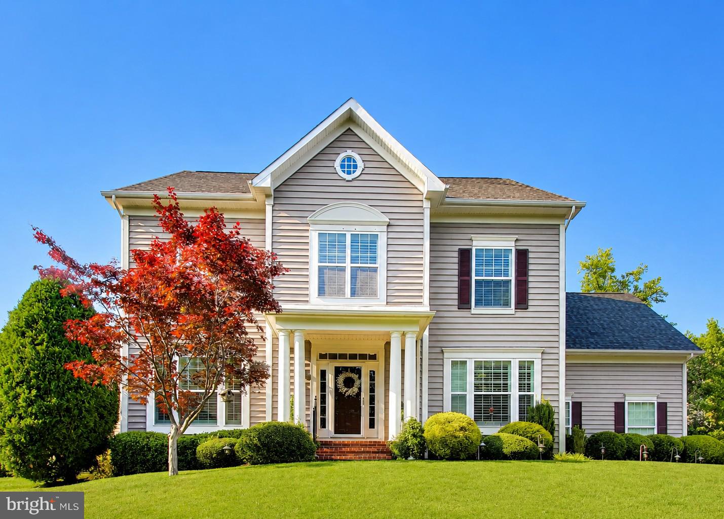 This beautifully appointed home offers more than 5,200 square feet of living space, with a layout that feels both spacious and comfortable from the moment you step inside. The main level has a wonderful flow for everyday living and entertaining, beginning with the formal living and dining rooms and continuing into the bright kitchen, breakfast area, and inviting family room. The kitchen is a true centerpiece, featuring white cabinetry, granite countertops, stainless steel appliances, a gas cooktop, double wall ovens, a large island with seating, pendant lighting, and an impressive walk-in pantry. Just off the kitchen, the breakfast area opens to the rear deck, while the family room offers a warm and welcoming gathering space with its stone fireplace. A private office, powder room, and mudroom entrance add even more function to the main level.

Upstairs, the open corridor and sitting area create a nice sense of space before leading to four generously sized bedrooms. The primary suite offers a comfortable retreat with a tray ceiling, dual walk-in closets, and a private bathroom with separate vanities, a soaking tub, and separate shower. The second bedroom also includes a walk-in closet and private full bathroom, making it a great option for guests or anyone who prefers additional privacy. Bedrooms three and four offer ample closet space and ceiling fans, and the upper-level laundry room adds everyday convenience.

The finished basement provides even more room to spread out, with a huge recreation room, a fifth bedroom, and another full bathroom. Whether used for movie nights, games, fitness, guests, or extended living space, this level offers tremendous flexibility. Outside, the large rear deck overlooks a fenced backyard with mature trees, open lawn space, and a storage shed. The two-car side-loading garage, attractive curb appeal, and thoughtful indoor and outdoor spaces make this a home that is easy to enjoy and easy to live in.