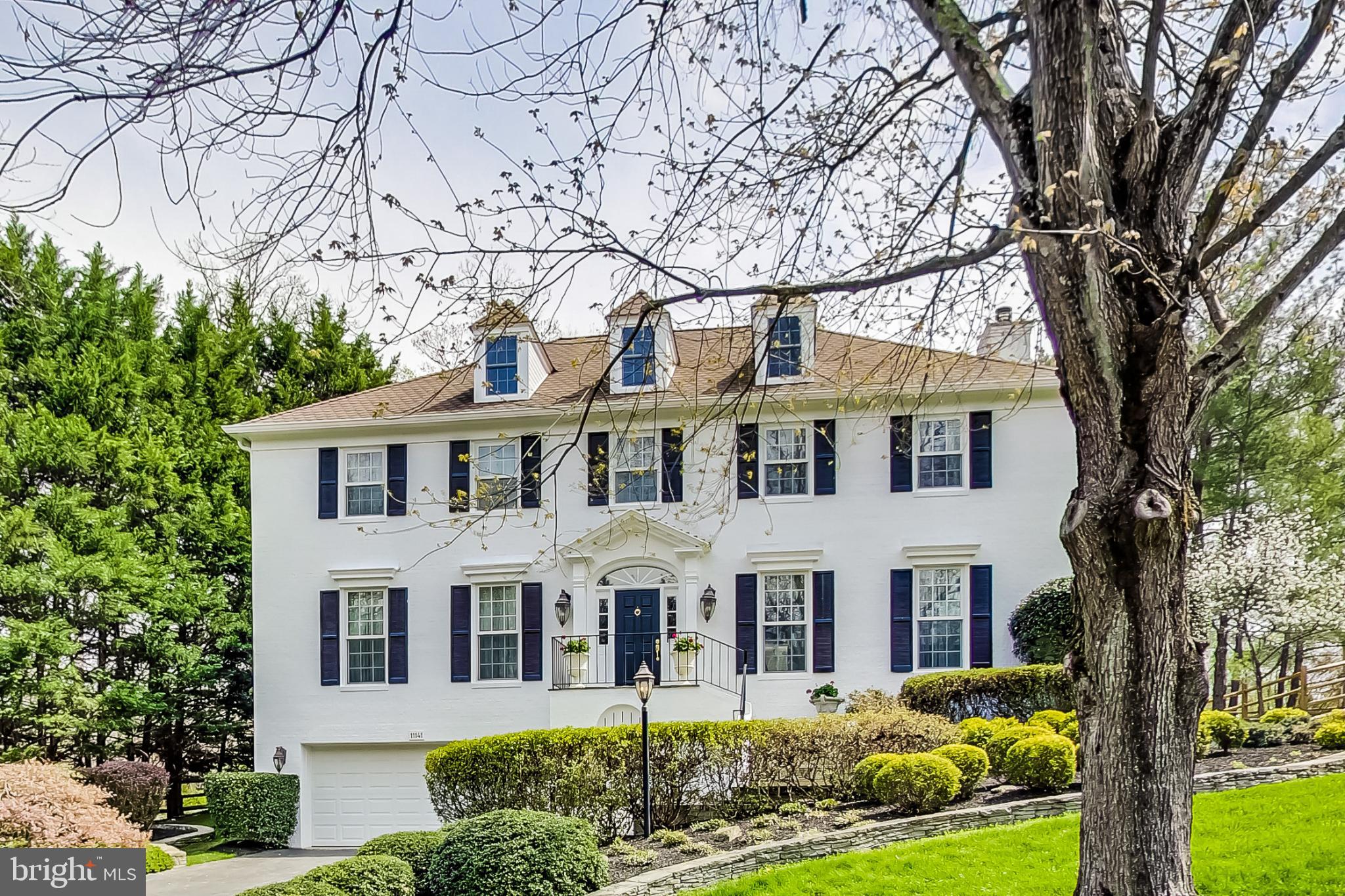 OPEN SUN 1-3 PM! Gorgeous renovated colonial in Normandy Hills! This amazing home features 5BR/4.5BA and luxury features throughout. The perfect blend of traditional finishes coupled with contemporary renovations makes this home truly move-in ready.  The owners have been here for 25 years and have taken immaculate care of the property.  They have made many upgrades including a fully renovated and expanded kitchen, tastefully renovated bathrooms with modern finishes, new roof, new deck, hardwood floors including on the lower level, new windows, window treatments, and more! The main level features a stunning foyer w/marble floors, living room, formal dining room, large kitchen w granite counters and ample cabinetry, Sub Zero fridge and butler's pantry; light-filled breakfast room, opening to large family room w/fireplace, first-floor private office, and powder room.  The upper level features a primary suite w/sitting room or 2nd home office, multiple walk-in closets, dressing room & vanity area, and renovated spa-like bath. There are 3 additional bedrooms w/walk-in closets, 2 newly renovated bathrooms, and convenient upper-level laundry room.  Downstairs, the expansive lower level offers a recreation room, full bath, and optional guest suite. There's an oversized two-car garage with additional storage too.  Outside, the yard is expansive and breathtaking.  The huge, low-maintenance deck is perfect for entertaining or relaxing.  This property has so much to offer!