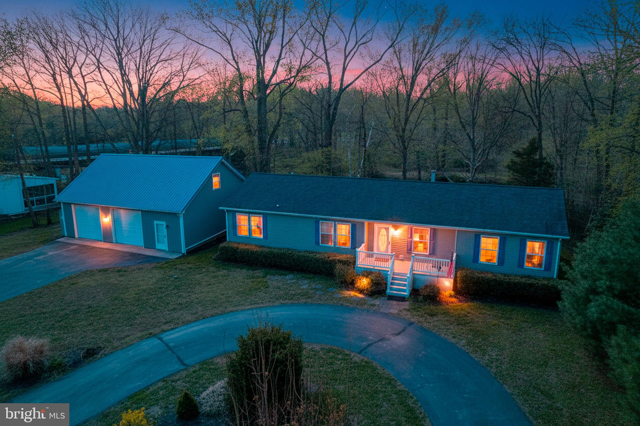 Spacious waterfront rancher with pole barn—priced below appraised value for a quick sale! Appraised at $534K, this motivated seller is offering a rare opportunity for instant equity on the upper Chester River. Conveniently located with easy access to Rt. 301, making commuting to Philadelphia, Middletown, or the Chesapeake Bay Bridge surprisingly convenient while still enjoying the perks of waterfront living.

This well-maintained 3-bedroom, 2.5-bath rancher offers comfortable one-level living with beautiful river views throughout. The inviting living room features a stone propane fireplace, while the spacious primary suite includes a second gas fireplace, oversized bath with garden tub, walk-in shower, and private water closet.

The kitchen was designed with both entertaining and everyday living in mind, featuring an island, double ovens, farmhouse sink, and river views right from the window. The dining area opens to a rear deck with retractable awning—perfect for relaxing evenings overlooking the water.

One of the standout features is the impressive 1,200 sq. ft. pole barn connected by a breezeway. Complete with a second level and motorized lift, this space is ideal for contractors, hobbyists, boat storage, workshop space, car enthusiasts, or anyone needing serious storage and flexibility.

Outside, enjoy kayaking and fishing right from your own property. The home is elevated well above the floodplain and may offer future options for water access improvements such as steps, a bulkhead, or small pier (buyer to confirm with county).

Additional highlights include public water and sewer, a separate irrigation well, professionally landscaped grounds, regularly serviced HVAC, resealed driveways, and proactive maintenance throughout. Less than a mile to Food Lion and convenient to Chestertown, Middletown, and Bay Bridge travel routes.

Freshened up for spring and ready for its next owner—add this waterfront opportunity to your watch list before it’s gone! All offers considered.