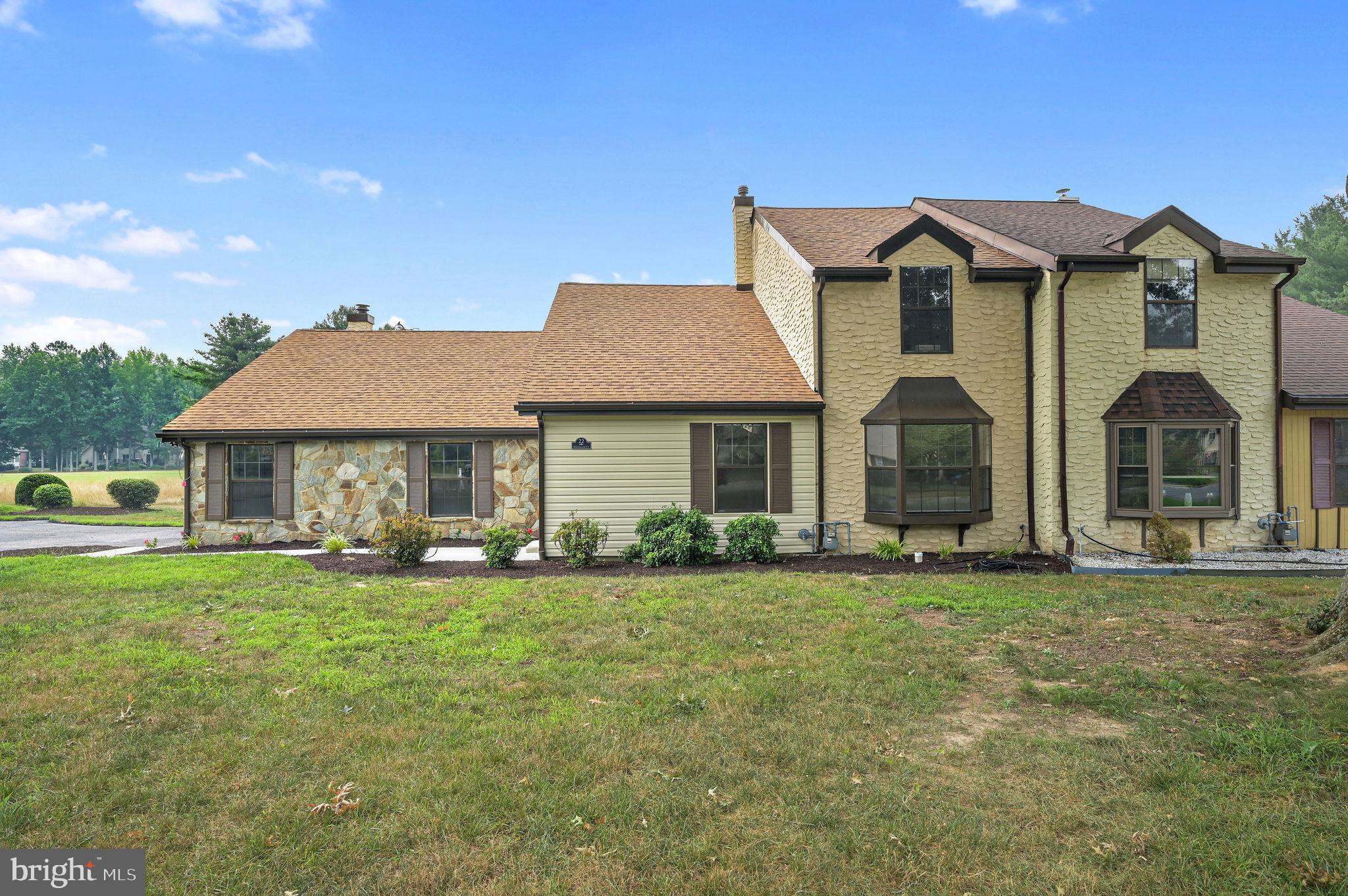 Beautifully renovated 2,700-square-foot twin overlooking the golf course with no HOA! This move-in-ready home has been updated from top to bottom, featuring a stunning new kitchen with new cabinetry, countertops, sink, and stainless steel appliances, plus all new windows, sliding glass doors, and flooring throughout. The thoughtfully designed floor plan offers three spacious bedrooms, each with its own private en suite bath, including a desirable first-floor bedroom  suite. A first-floor powder room and laundry add everyday convenience. The oversized garage with a storage closet provides plenty of room for vehicles, hobbies, and extra storage. Enjoy peaceful golf course views, quality renovations, and maintenance-free living in a beautifully updated home that's ready for you to move right in.