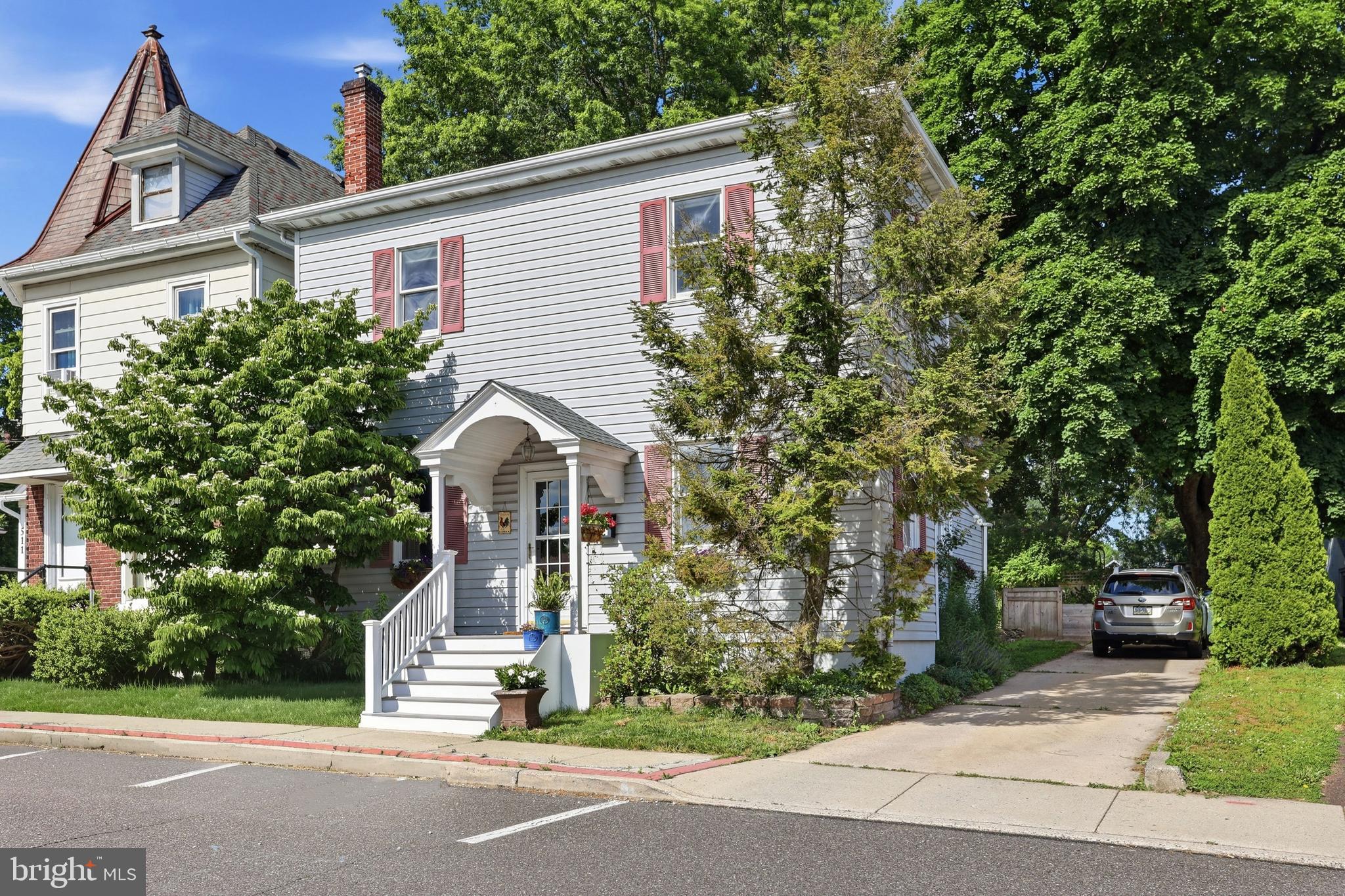 Welcome to this charming Colonial in the heart of Perkasie Borough, where small-town charm meets everyday convenience. Just steps from local restaurants, shops, parks, and community events, this well maintained 3-bedroom, 1.5-bath home offers the walkable lifestyle you've been searching for. Inside, you'll find a spacious floor plan with 9-foot ceilings, rich hardwood floors, and timeless architectural details throughout. The inviting living room features built-in corner shelving, while the updated kitchen boasts granite countertops, a breakfast bar, recessed lighting, and an open flow into the generous dining area accented with elegant dental crown molding. A convenient main-level laundry room and powder room add functionality, while the versatile bonus room is perfect for a home office, den, playroom, or additional sitting area. Upstairs, three spacious bedrooms provide comfortable accommodations, including a large primary bedroom with crown molding and double closets. The hall bath features a double vanity, offering both style and convenience. Step outside through the second-floor sliding glass doors to a spacious deck overlooking the private, fenced backyard below. The backyard retreat also includes a patio and storage shed, creating the perfect setting for outdoor entertaining, gardening, or simply relaxing. Combining character, space, and an unbeatable location in the vibrant center of Perkasie Borough, this wonderful home is ready to welcome its next owner.