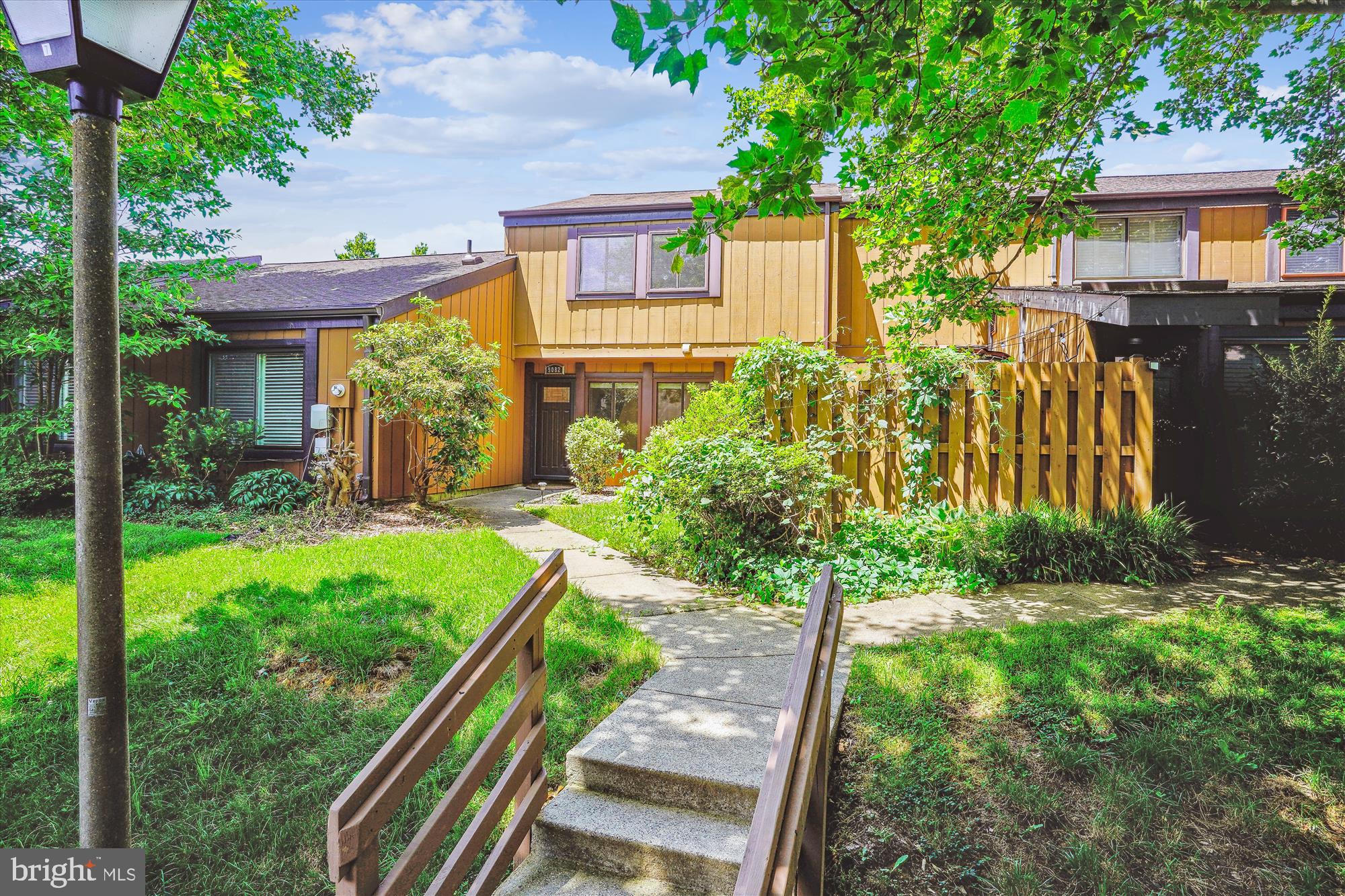 Beautiful 3-bedroom, 2.5-bath, 2-level townhouse in Fairfax featuring an open and functional floor plan. The spacious living and dining room combination offers an ideal space for everyday living and entertaining. The updated kitchen features stainless steel appliances, stylish backsplash, upgraded countertops, and abundant cabinet storage. Main-level washer and dryer plus a convenient powder room add to the home’s practicality.  Upstairs, the primary suite includes an en-suite bath, while two additional bedrooms with ceiling fans share a second full bathroom. Enjoy outdoor living with a private patio and fully fenced backyard. Major updates include a new energy-efficient heat pump installed in 2023 and water heater replaced in 2019.  HOA includes trash removal. Two assigned parking spaces convey. Excellent location close to the Mosaic District, shopping, restaurants, bus stops, Route 50, and major commuter routes. A must-see!