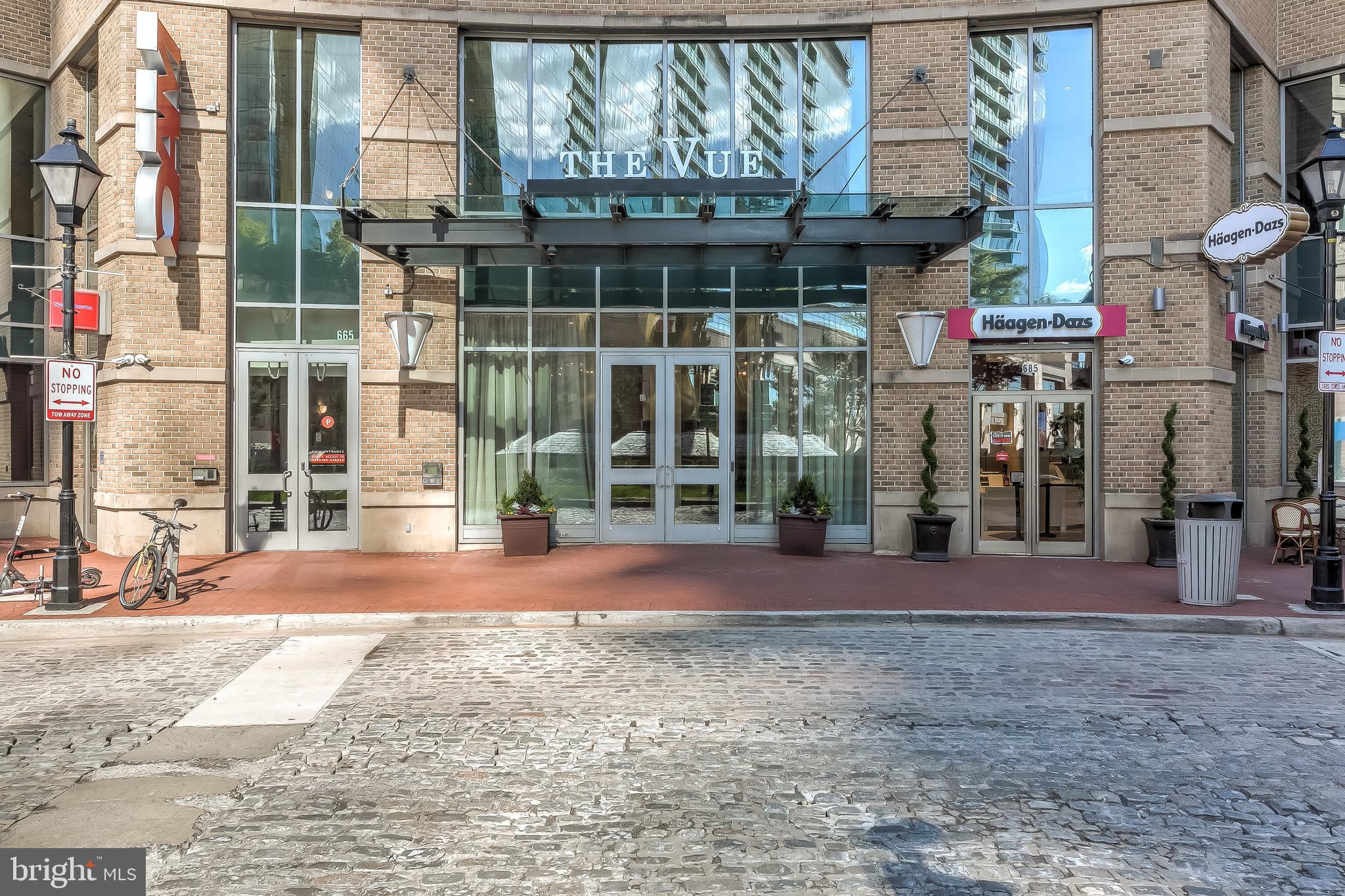 LUXURIOUS WATERFRONT CONDO IN HARBOR EAST AT 'THE VUE'. FULLY RENOVATED 2 BEDROOMS WITH 2 FULL BATHROOMS. LOADS OF NATURAL LIGHT. HIGH CEILINGS. ENJOY CUSTOM CABINETRY, IMPORTED TILE, UPGRADED TRIM PACKAGE, GRANITE COUNTERTOPS, STAINLESS STEEL APPLIANCES IN DESIGNER CHEF'S KITCHEN. EXPANSIVE WATER AND CITY VIEWS. OVERSIZED UNIT WITH 1,450+ SQUARE FEET. 1 ASSIGNED GARAGE PARKING SPACE. CLOSE PROXIMITY TO LOCAL SHOPPING, RESTAURANTS, ALL MAJOR HIGHWAYS, WHOLE FOODS, CVS, GYM, THEATER, AND THE INNER HARBOR. SCHEDULE YOUR PRIVATE SHOWING TODAY! AVAILABLE JULY 1ST
