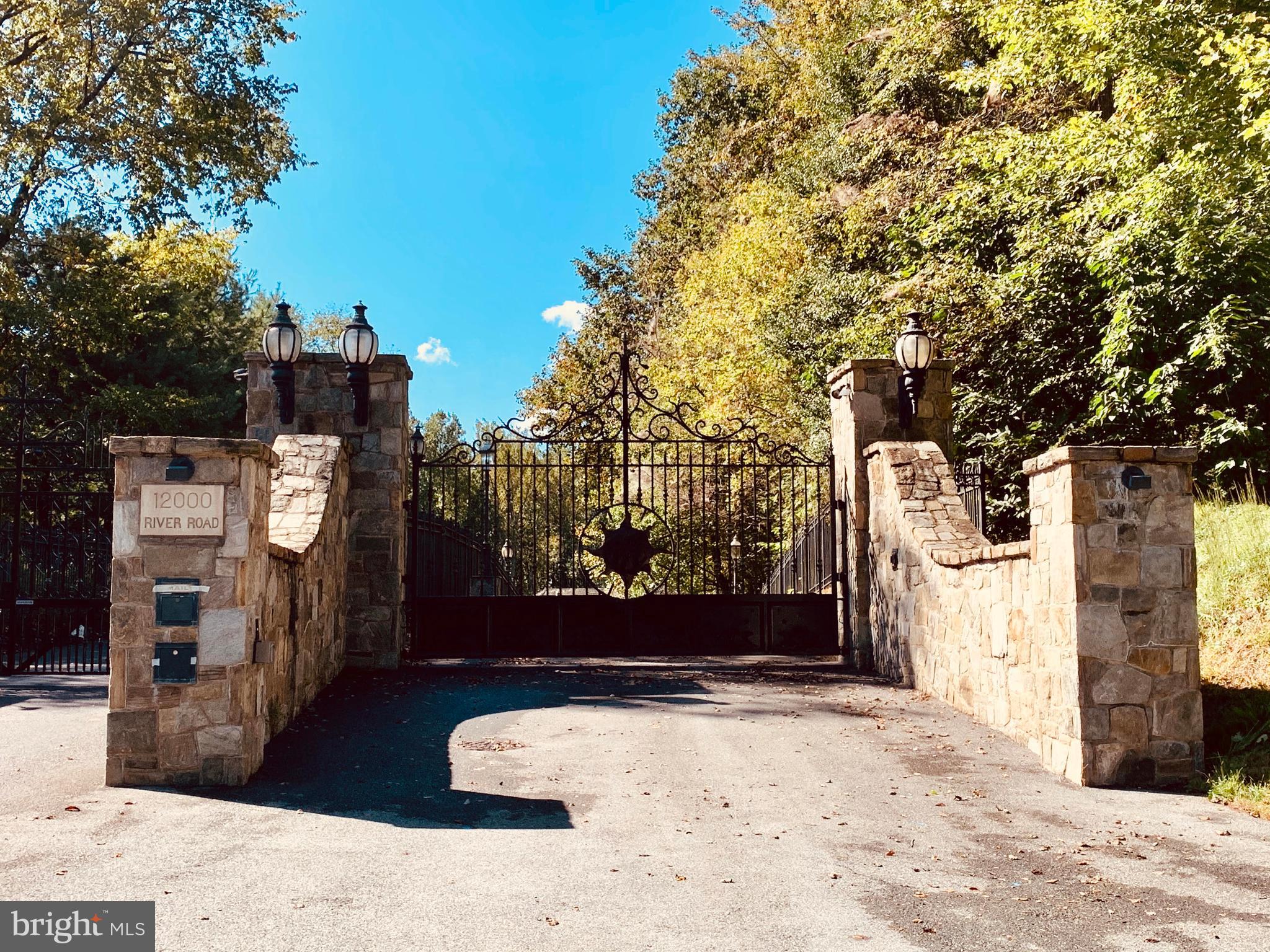 A beautiful sanctuary awaits you along the prestigious River Road in Potomac, Maryland. Dramatic cast-iron gates lead you from River Road down several hundred yards of your private paved road into over three acres looking over the Potomac River and C&O Canal partially.  The lot is surrounded by well-grown woods and the forest conservation area. This exclusive safe haven is fully fenced in, utilities ready, and ready to build your own dream house. It has some river view in late fall and winter.The property is adjacent to protected national parkland near the canal and the river, but does not have the direct access.