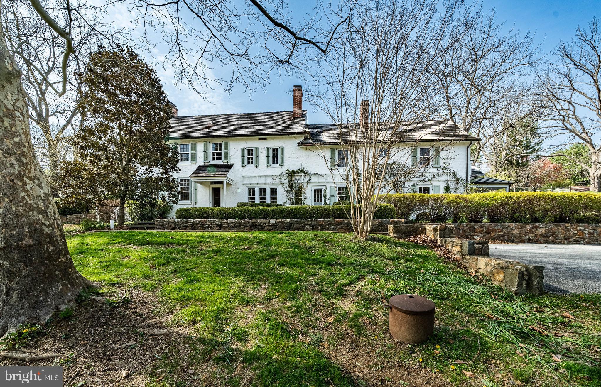 Discover timeless elegance at 401 West Locust Lane in Kennett Square, PA—a distinguished manor home originally built in 1822 and thoughtfully expanded over the centuries. Set on 6.9 lush acres, this 4,353 sq ft residence seamlessly blends historic charm with modern amenities. ￼

The main house features five spacious bedrooms and four and a half bathrooms, adorned with wide-plank hardwood floors, exposed beams, and five fireplaces with original mantels. The gourmet kitchen boasts a Viking 6+ burner stove with griddle and dual ovens, a second gas cook top, dual sinks, and extensive soapstone countertops. Recent enhancements include a mudroom, pantry, and a screened porch off the primary suite, offering serene garden views. ￼

A detached 3-car garage includes a charming one-bedroom, one-bathroom apartment—ideal for guests or extended family. The property also features stone terraces, mature gardens, and fenced areas perfect for recreation or pets. Modern upgrades encompass central air conditioning, radiant heat in brick floors, updated plumbing and electrical systems, and a generator. Public water and sewer services have been added for convenience. ￼

Located within the esteemed Unionville-Chadds Ford School District, this estate offers proximity to downtown Kennett Square’s vibrant dining and shopping scene, the Kennett Square Country Club, and major routes to Wilmington and Philadelphia. Experience the perfect harmony of historic character and contemporary living in this exceptional property.
