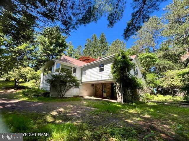 Charming 3-bedroom, 1.5-bath ranch home full of timeless character! Built in 1919, this home blends historic charm with everyday comfort and is conveniently located in the heart of Mt. Pocono, within walking distance of the Martz Bus Station. Hardwood floors throughout and original woodwork that showcases the home's classic craftsmanship and old-world appeal. Needs TLC. Priced to sell--don't miss your chance to own this charming Mt. Pocono gem! Seller is licensed PA Realtor.