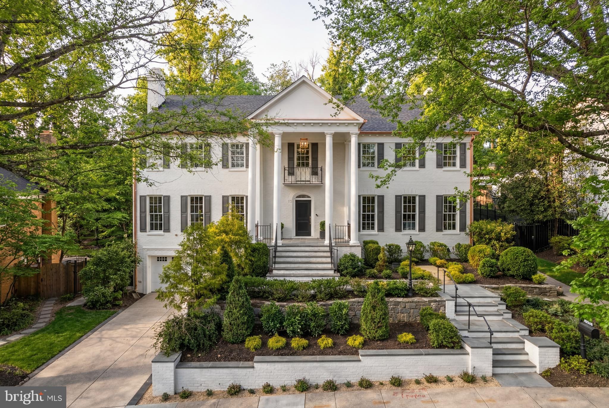 With a quietly commanding presence in Spring Valley, this fully reimagined residence by District495 reflects a level of design and execution rarely seen at this scale. This home has been taken down to its essence and rebuilt with a singular focus on elegance, proportion, and modern livability.  Curated by a best-in-class team to include MCD Studio and Martha Vicas of Sophîste, the result is a residence that feels cohesive, intentional, and complete.
 
From the moment you enter, the experience is defined by light and volume. Clean architectural lines are softened by layered textures, bespoke millwork, and a warm, tonal palette that creates interiors that feel both elevated and deeply livable. Every finish has been curated with intention, from hand-selected stone and custom cabinetry to designer lighting that quietly punctuates each space.

The kitchen anchors the home as both a showpiece and a gathering place that’s seamlessly integrated into the surrounding living and entertaining spaces. Throughout, the home unfolds with a sense of ease, formal and informal moments exist in balance, while more private spaces offer a calm, retreat-like atmosphere.

Outdoors, the rear grounds unfold as a private extension of the home that’s thoughtfully designed for both quiet moments and elegant entertaining. Professionally landscaped with layered plantings and ambient lighting, the setting is equally suited for intimate evenings or larger garden gatherings. Beyond, the property enjoys a rare and uninterrupted backdrop, backing to the protected Dalecarlia Reservoir grounds that offer a sense of openness and natural beauty that is seldom found in the city.

Behind the walls, the home is equally considered. Advanced systems, EV charging outlets, integrated smart home technology, and future-forward infrastructure, such as provisions for an elevator, speak to a level of planning that anticipates both comfort and longevity. Enjoy the ease of walkable living just moments from Spring Valley’s most beloved destinations - Millie’s, Bluestone Lane, Wagshal’s Market, Crate & Barrel, and more.

This remarkable residence is set within one of Washington DC’s most established neighborhoods showcasing Spring Valley living redefined through the lens of District495.