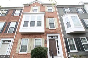 Spacious modern Brick townhouse packed with upgrades. 10 Ft. ceilings, hardwood floors, LR/DR with fireplace. Spacious kitchen and breakfast room and a powder room on the 2nd level. Three bedrooms 2 full bathrooms on the Third/Top level. ENTRY level with den and powder room.