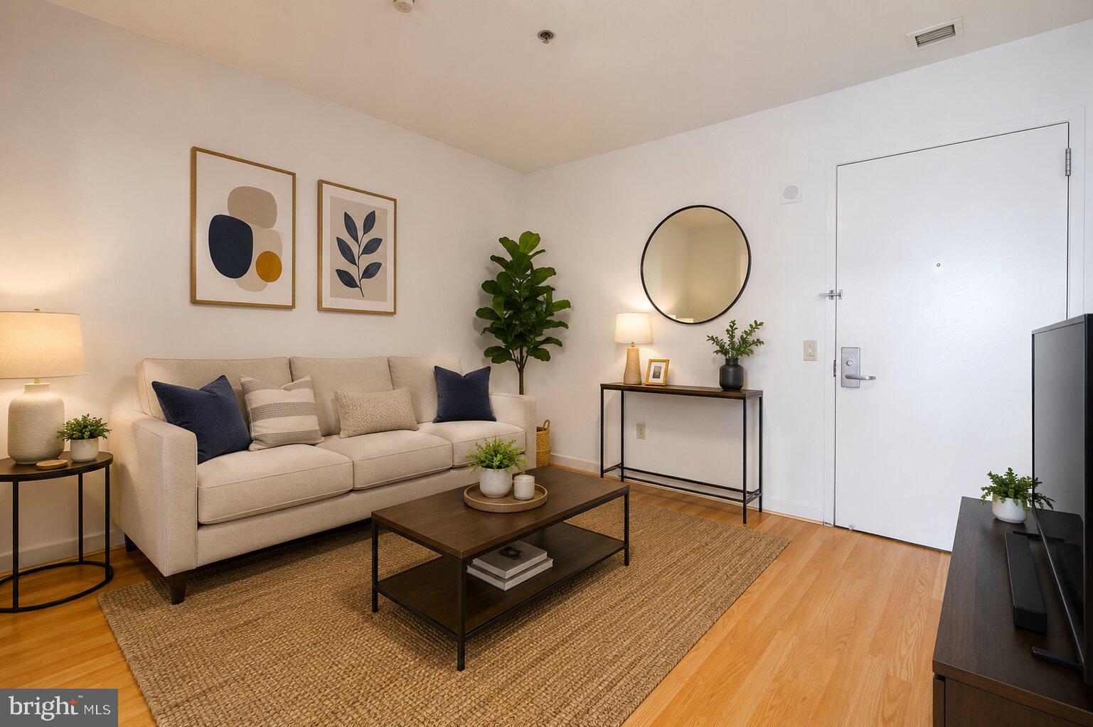 The Grand View Condominiums is a modern, pristinely kept high-rise in the heart of Philly's Chinatown, offering a welcome desk staffed 24/7, elevator access, a gym, on-site laundry, a peaceful garden, a dog run, a community lounge, and other sought-after amenities. Unit #415 is a large, updated 1 bedroom, 1 bathroom condo highlighted by a great layout. Stepping inside, you'll find a spacious living room with plenty of room to hang out. The galley-style kitchen has ample cabinetry space, a full suite of appliances including a dishwasher, and breakfast bar seating. Completing the unit is a sunlit primary suite with a huge bedroom showcasing tall windows, a double closet, and an extra-wide vanity, separate from the full bathroom, allowing for simultaneous use. The condo has central a/c, gas heat, and gas hot water. In addition to everything inside, this fantastic location earns a near-perfect Walk Score of 99! Chinatown is brimming with top-rated restaurants, popular shops, local markets, and lively entertainment. The Reading Terminal Market, the Fashion District, City Hall, and Franklin Square Park are all a few blocks away. There's also easy access to public transit, Broad St, I-676, I-76, I-95, and South Jersey. Schedule your showing today! Some photos are AI enhanced.