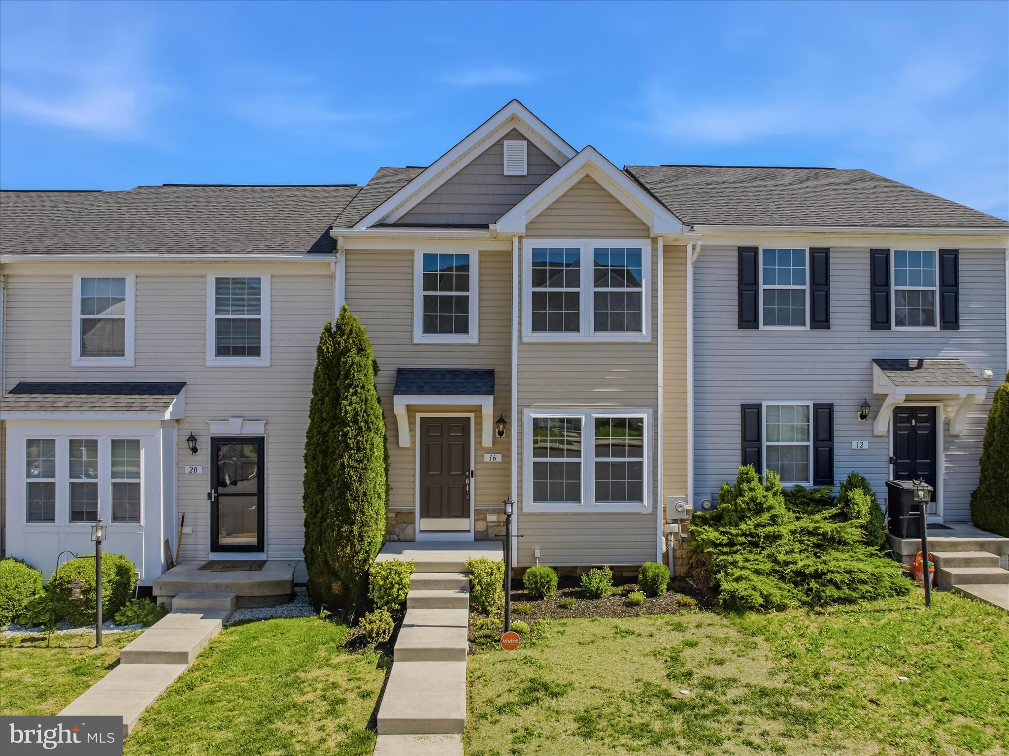 Welcome to 16 Britania Ct in Martinsburg—where comfort, convenience, and low-maintenance living come together. This 3-level townhouse has been freshly updated with-- new carpeting-- and --fresh paint-- and offers 3 bedrooms, 2 full and 2 half bathrooms, including a finished walkout basement, providing plenty of room for everyday living and entertaining. The main level offers a bright, functional layout filled with natural light. Downstairs, the finished walkout basement provides versatile space and features a half bath and walk-in closet—ideal for a guest room, rec room, home office, or fitness area.. The upper level features three bedrooms and two full bathrooms, including a spacious primary suite complete with a walk-in closet and a well-appointed attached bath.  Enjoy the backyard setting as the home backs to a common area, creating a more open feel than typical townhouse living. Conveniently located in Martinsburg, you’ll be just minutes from shopping, dining, schools, and major commuter routes for an easy, connected lifestyle. Don’t miss your opportunity to own a move-in-ready home in a convenient and desirable location!