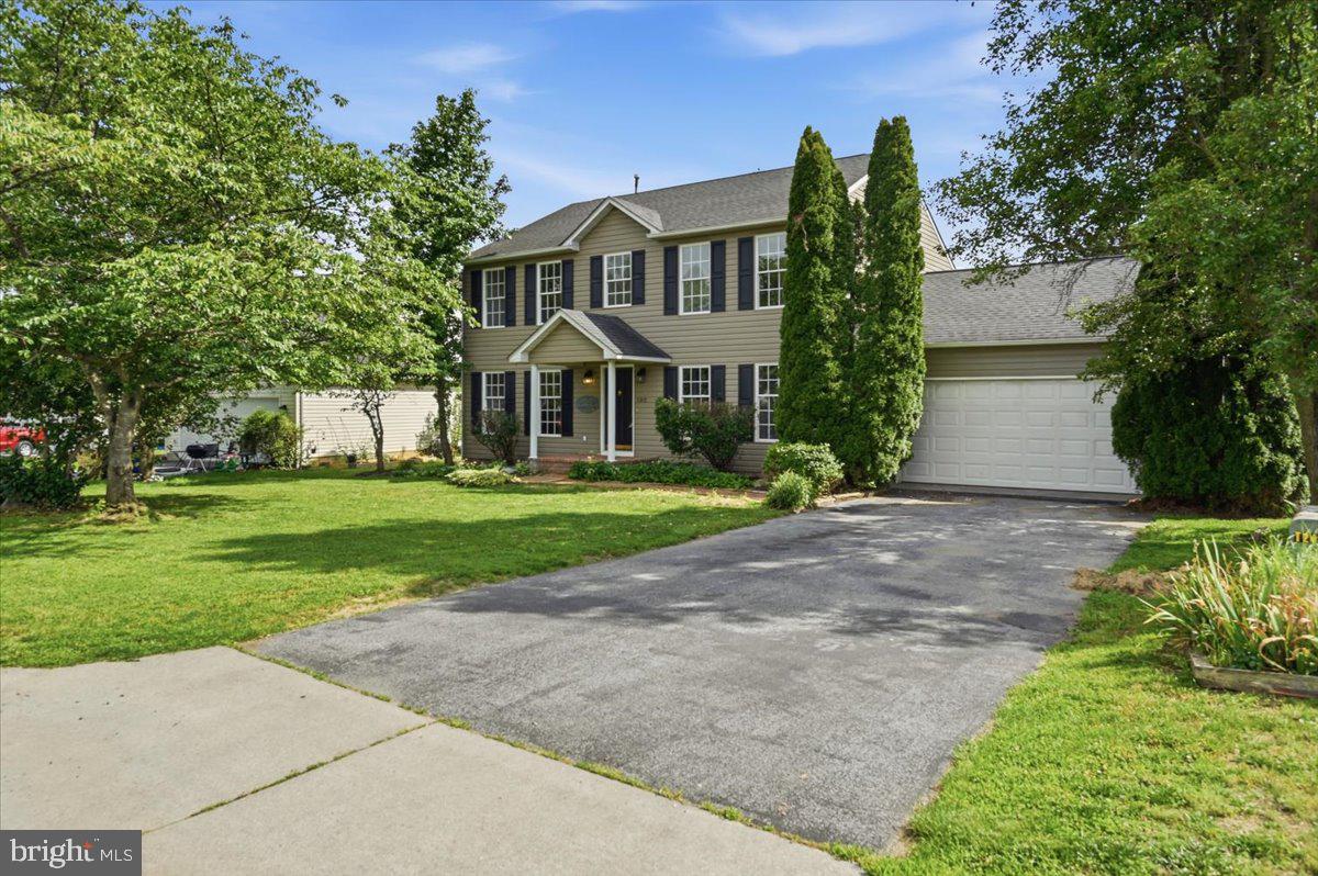Updated 2 Level Colonial with Attached 2 Car Garage and Stunning Curb Appeal. This Move-In Ready Home Features Stainless Steel Appliances, a Large Open Kitchen With Center Island, and a Bright, Flowing Layout Perfect For Everyday Living and Entertaining. The Soaring 2 Story Entryway Creates an Impressive First Impression, While New Flooring, New Paint and Updated Lighting Add a Fresh, Modern Feel Throughout. Cozy Up by the Fireplace in the Inviting Living Area and Enjoy Spacious Bedrooms Including a Generous Primary Suite with Walk-In Closet. Updated Bathrooms Offer Stylish Finishes and Added Comfort. Step Outside to a Fully Fenced Backyard Complete with Patio and Storage Shed, Ideal For Outdoor Gatherings, Pets, and Extra Storage.  Hurry This Will Not Last!