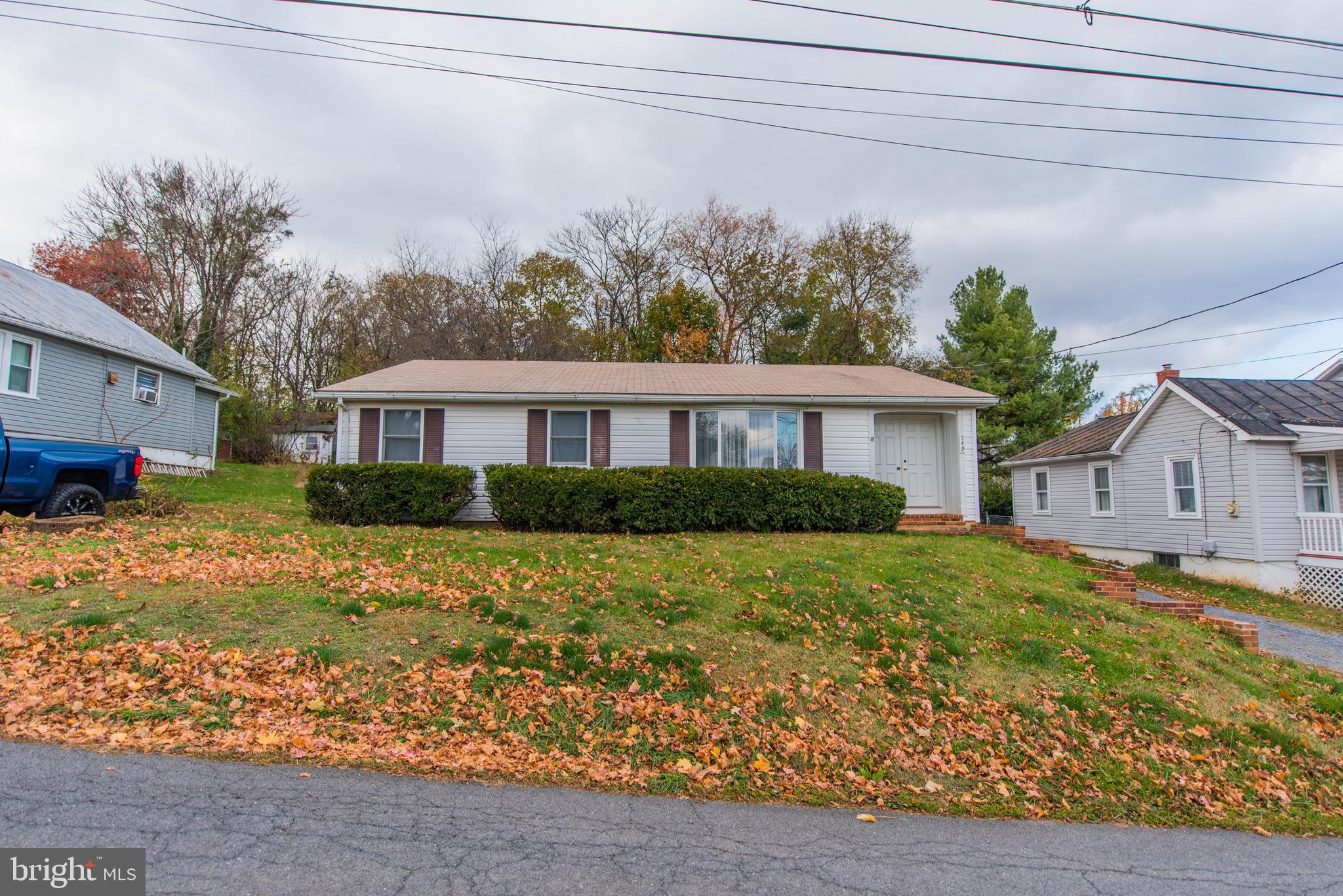 So much house!  This 3BR/2BA home has over 1500SF of living space on the main floor!  You will notice new carpeting throughout, generously sized rooms (17x11 master bedroom and 16x13 living room), and a cozy wood-burning stove in the family room.  Downstairs, the full-sized, partially-finished basement allows for ample storage and/or possible additional living space.  Ready for your finishing touches, there is plenty of potential in this lovely house!