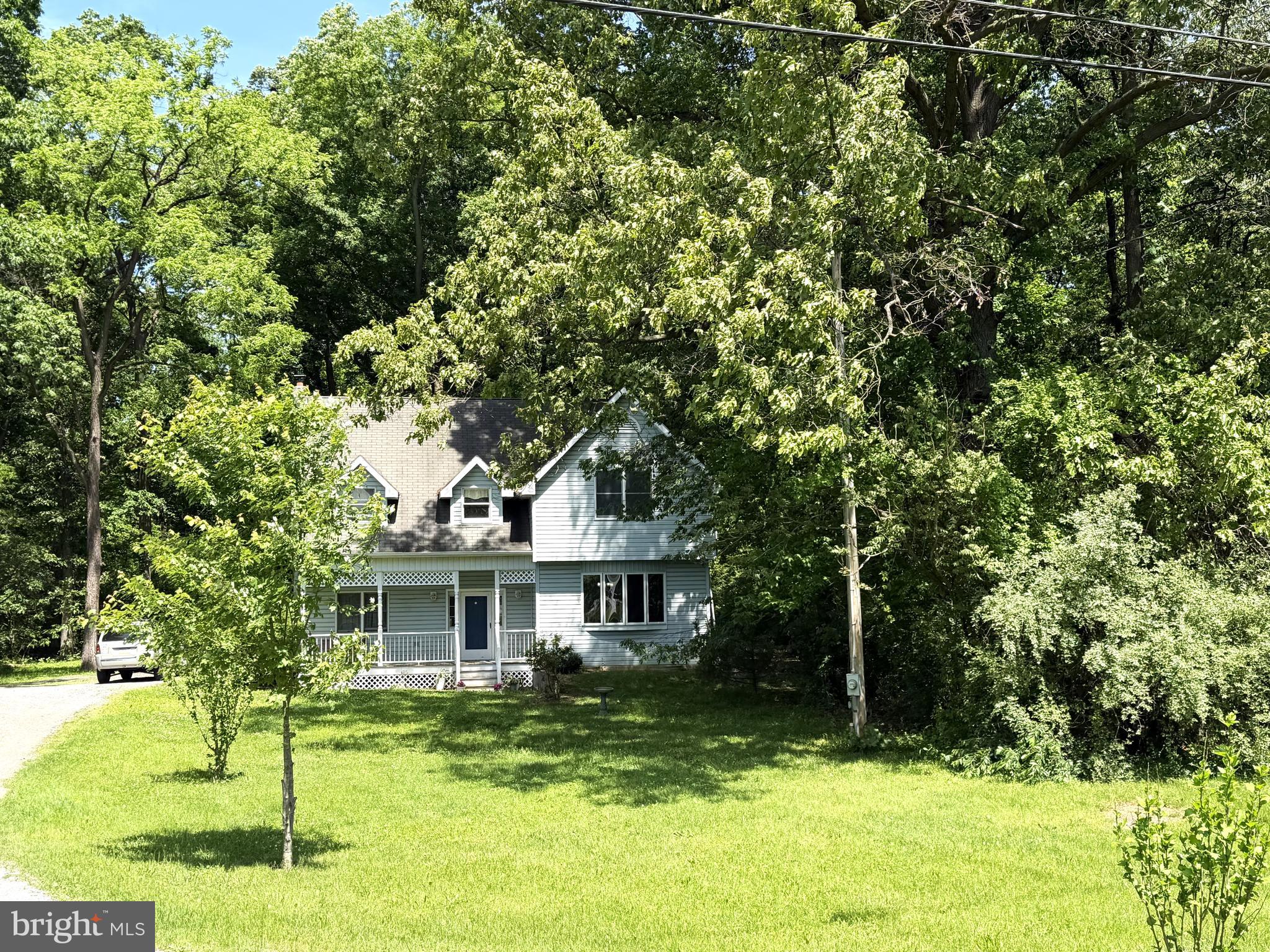 Welcome to this spacious, three-bedroom Colonial sitting on a private setting of 5.62 wooded acres!!!
Living room features oak hardwood flooring and formal dining room has cherry hardwood flooring.
Kitchen boasts oak cabinets with a center island, natural gas range, dishwasher, refrigerator and separate upright freezer.  Family room open to the kitchen with cathedral ceilings and sliding glass doors to the back yard.  First floor laundry and half bath.    Leading to the upper level, you will find a wide oak tread stairway with a mid-way landing.   Bedrooms have been freshly painted and carpet installed.  Master bath is plumbed and ready to be installed.    The home is constructed with 2x6 walls and metal "I- beams" in the basement.  Provisions have been made in the basement for a fireplace and natural gas connections are in place.  The wooded area has many walnut trees to be timbered in about 8 years.  Also, some red oak and hickory.    More information about the property to be posted.