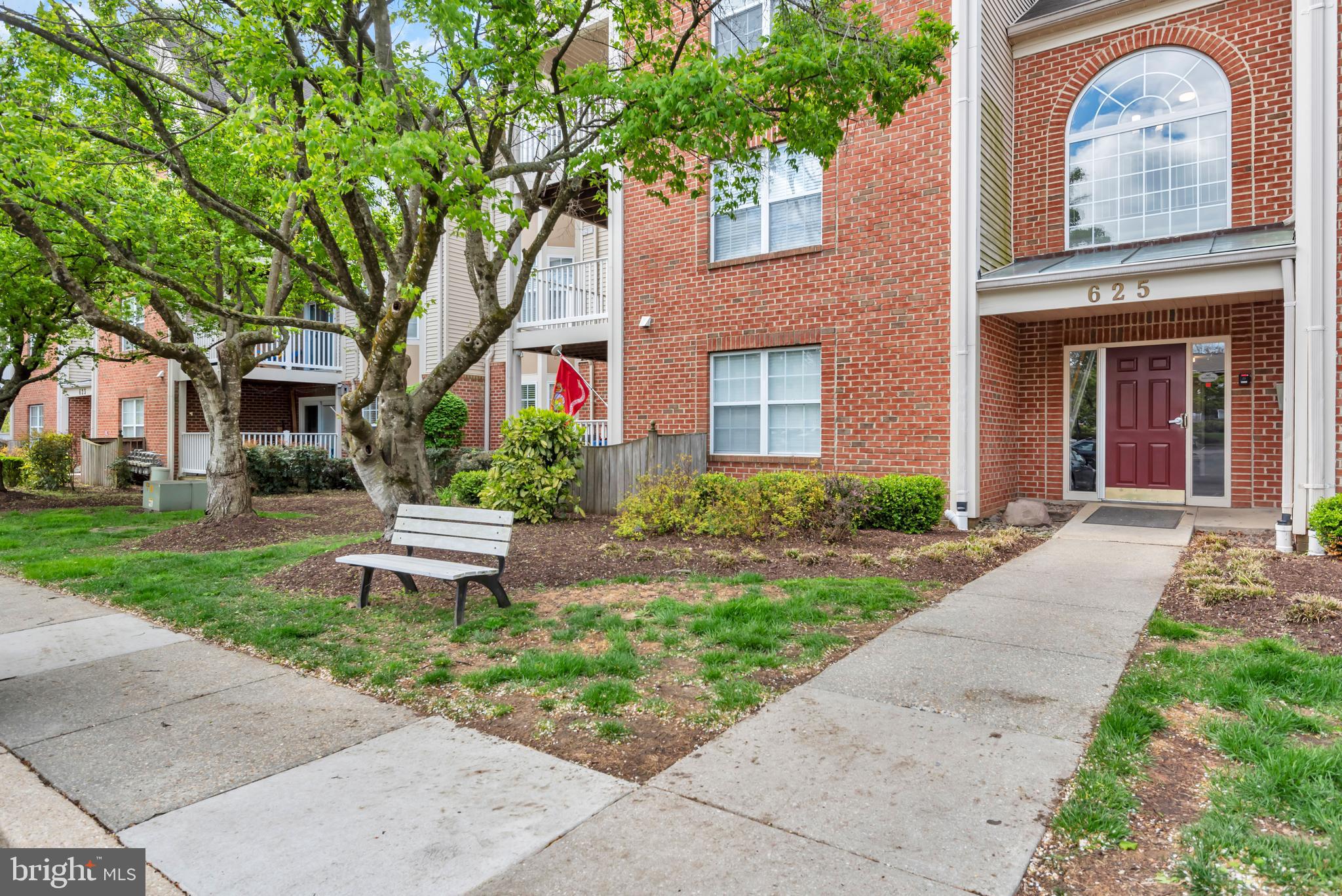 This beautifully updated condo features a welcoming open floor plan, private balcony and quiet tree-lined view! Enjoy the brand new carpet and luxury vinyl flooring as well as fresh paint throughout. Step into the living room with a cozy gas fireplace, open to a spacious dining area and bright kitchen with breakfast bar.  Just off the kitchen, your peaceful balcony provides a covered outdoor area with a serene view of the woods. A spacious primary suite incudes an updated bathroom; you'll love the enormous walk-in closet! The second bedroom could also serve as a perfect home office and/or guest bedroom. The sparkling hall bath includes a tub/shower. The in-unit laundry room also has additional shelving and storage space. The fabulous community amenities at Harbour Gates include an outdoor pool, fitness center, clubhouse, tennis and basketball courts, as well as space to grill out come summer! Convenient surface parking is right outside the secure building entrance. Harbour Gates is just around the corner from Anne Arundel Medical Center and the Annapolis Mall; live less than 15 minutes from Downtown Annapolis, convenient to Fort Meade/NSA and BWI Airport, and just off major commuting routes I-97 and Rt 50. Welcome Home! ***No Pets Please! Please note: Condo rules prohibit smoking in or near buildings.***