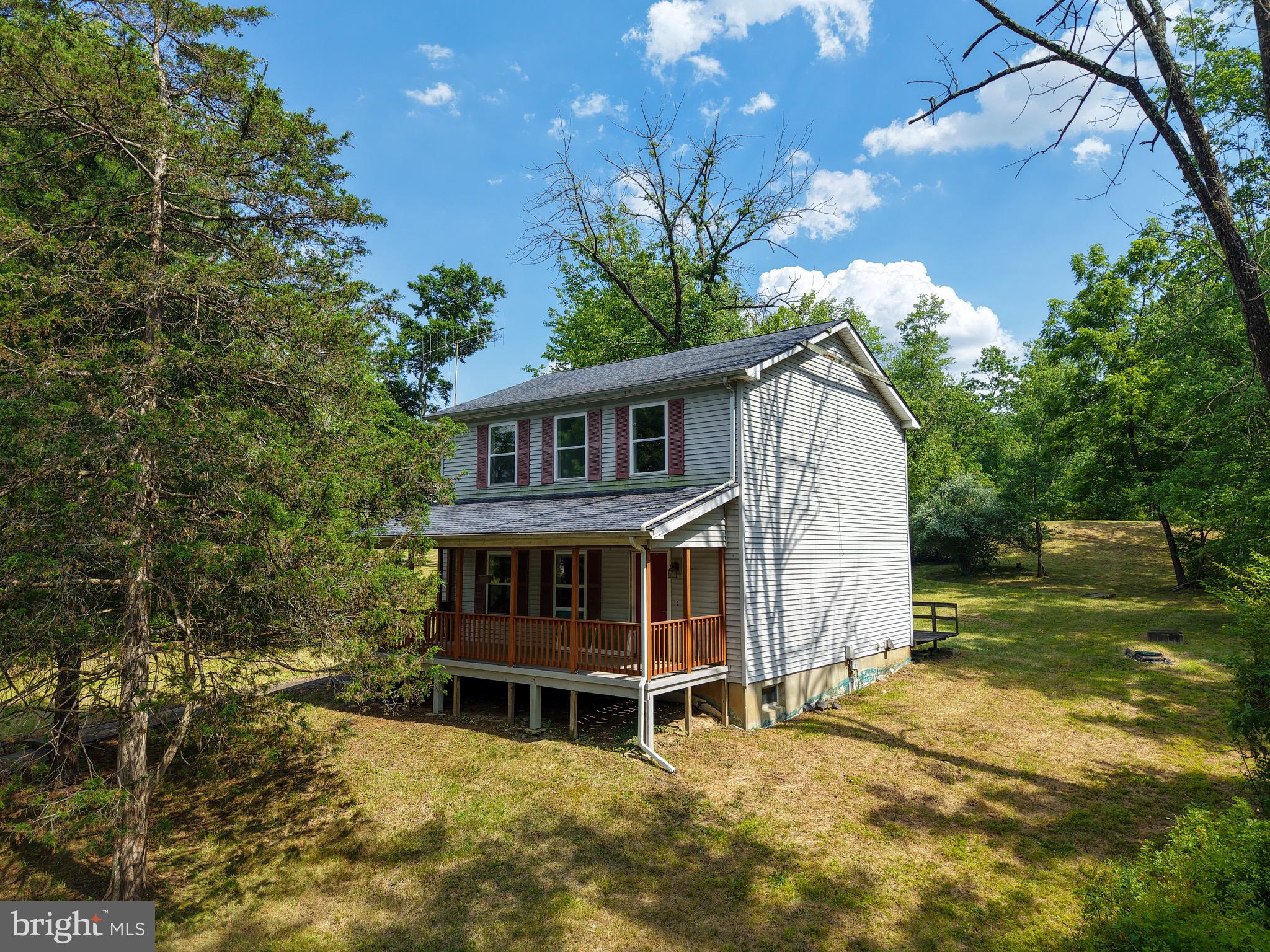 Welcome to 2015 Aquetong Road, a rare opportunity to own 10 beautiful acres just minutes from the heart of New Hope. Surrounded by the beauty of Bucks County, this exceptional property offers privacy, space, and endless possibilities.

The property features two separate homes, each offering its own unique character and potential. The primary residence includes three bedrooms and two-and-a-half bathrooms, with a welcoming front porch where you can enjoy peaceful mornings overlooking the tranquil setting.

The second home offers two bedrooms and two bathrooms and presents an outstanding opportunity for renovation. Whether you envision a guest house, private retreat, or additional living space for family and friends, it is ready for your personal vision and updates.

A detached three-car garage provides abundant space for vehicles, hobbies, equipment, and additional storage.

Nature enthusiasts will appreciate the property’s close proximity to the Delaware Canal Towpath, where you can enjoy the scenic beauty and peaceful surroundings that make this area so special.

Offering 10 acres in one of Bucks County’s most desirable locations, this unique property presents an exceptional opportunity to create a private estate, family compound, or peaceful countryside retreat just minutes from New Hope.

Both homes are being sold strictly in As-Is condition.