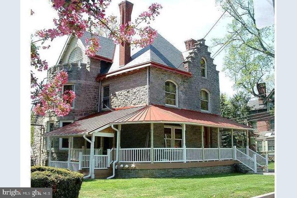 NOT A College STUDENT RENTAL-Only 1 student can reside here. Apartment was renovated less than 1 year. 2/3-bedroom apartment in one of the most majestic Stone buildings in the borough of West Chester. Short walk to center of town. 2/3 bedrooms, 3 full bathrooms, Security combo front door leads into the lobby currently a sitting room for all tenants. Winding wood staircase featuring beautiful stained-glass windows are breathtaking. Carpeted stairs leads onto 3rd floor landing, which are hardwood floors, except for bedrooms and bathrooms. Directly to the right of the stairs is a very large storage closet and a second closet for stackable laundry. Full beautiful large bathroom next to the kitchen. Newer installed kitchen (10 x 9.6) which offers breakfast bar area Stainless steel D/W, range, and Microwave. Atrium door leads to maintenance free rear deck (20 x 8) overlooking the rear yard and neighboring borough of West Chester. Area in front of kitchen can be a great room or E/I area (8 x 8) Tenants option to use the largest room as a mainbed-room suite or living/family-room. This arrangement would provide a 2-bedroom 3 full bathroom unit. Tenants choice on the floorplan. The center room (14.2 x 15.2) offers Amazing natural sunlight with French doors opening to a Gorgeous Stone balcony overlooking the community, including the library. This room has its own Full bathroom (7.8 x 7.9) and closet. The 2nd bedroom (13.9 x 15) also offers closet space and its own full bathroom (7.10 x 8.4). The front room by the stairs is a bedroom or possible Living-room/office. (13 x12). Electric heat-pump, C/A, Incredible vintage woodwork t/o the unit. Access to use the rear yard, front wrap around porch, inside 1st floor sitting room/lobby. Combination Lock front door entrance for security. Free on-street parking on N Church and West Marshall. Tenants pay electric, and hot water. Pets on case-by-case basis. Barclay Park across the street. Minimum gross monthly income to qualify is $7500. Furnished photos of a previous tenant.