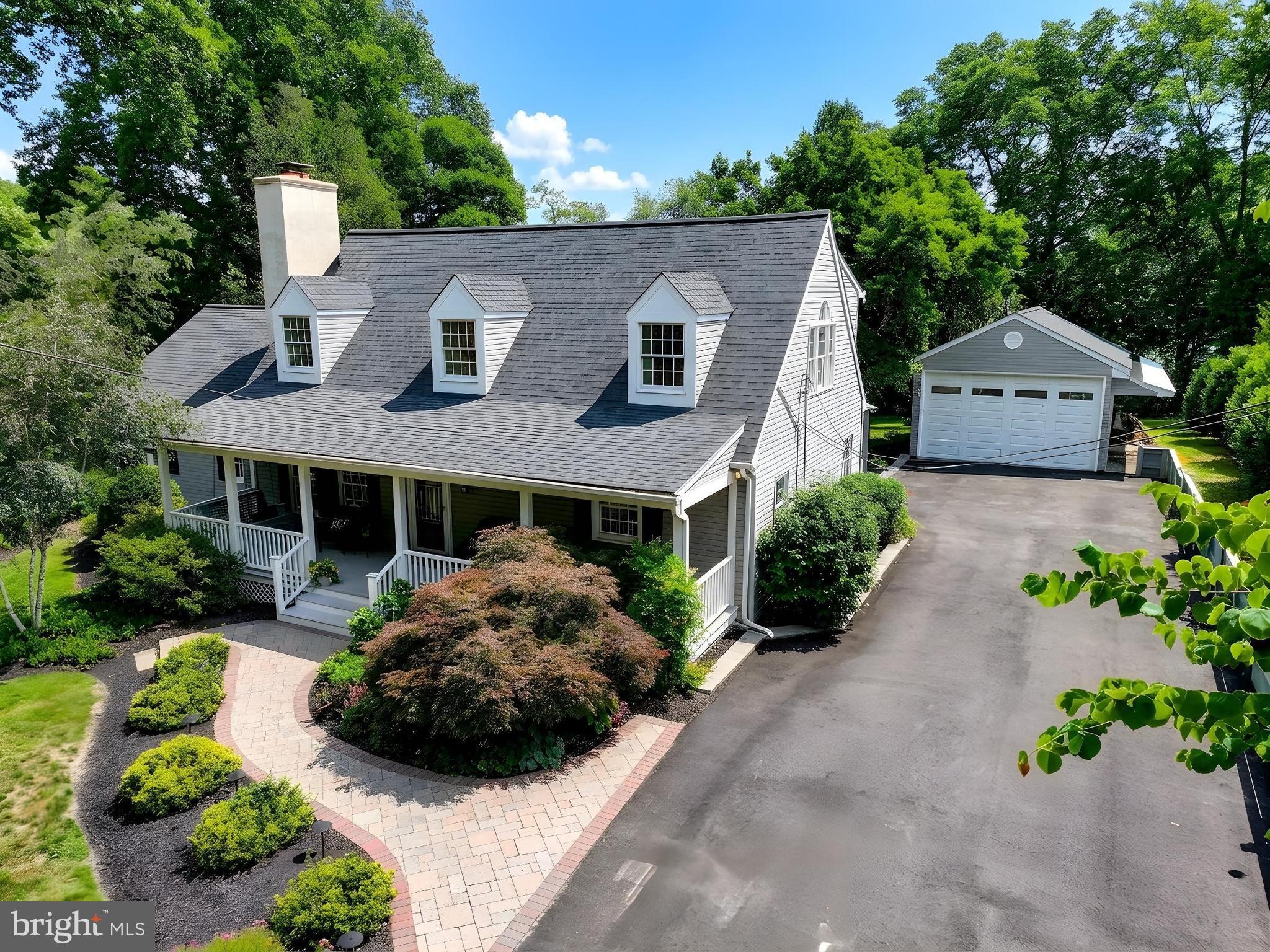Come see this extraordinary, beautifully maintained home offering an exceptional blend of comfort, space, and outdoor living. Featuring 4 bedrooms, 3 full baths, and an oversized 3-car garage, this special property is thoughtfully designed for both everyday living and memorable entertaining.

A long front porch welcomes you in, while gorgeous landscaping, stone patios, walkways, beautiful hardscapes, a fire pit, koi pond with a dozen 18-inch koi, composite decks, one of which is a  screened-in deck, create inviting spaces to relax and gather. Two open-view decks, an all-season room, and a peaceful setting that backs to trees with a pasture-like view provide wonderful places for quiet respite. The property also offers a 7-car driveway, additional parking or boat storage behind the garage, and an oversized shed.

Inside, you’ll find hardwood floors throughout the upper levels, luxury vinyl tile in the basement, abundant natural light, and many thoughtful updates, including windows and mechanicals within the last 10 years. The beautifully updated kitchen features quartz countertops, stainless steel appliances, and a welcoming flow into the home’s spacious living areas. A huge great room with cathedral ceilings and walls of windows creates a stunning centerpiece, complemented by a wood-burning and two gas fireplaces, a spacious private office, updated bathrooms, and a generous primary bedroom suite with cathedral ceilings. The upper-level laundry room adds convenience and function.

The finished lower level expands the living space with a large recreation room, second kitchen, wood shop, and a spacious study that could serve as a guest room, hobby space, or additional retreat.

Conveniently located near a full range of amenities and major roadways, this remarkable home offers space, flexibility, beauty, and comfort inside and out. Come make this beautiful home yours.