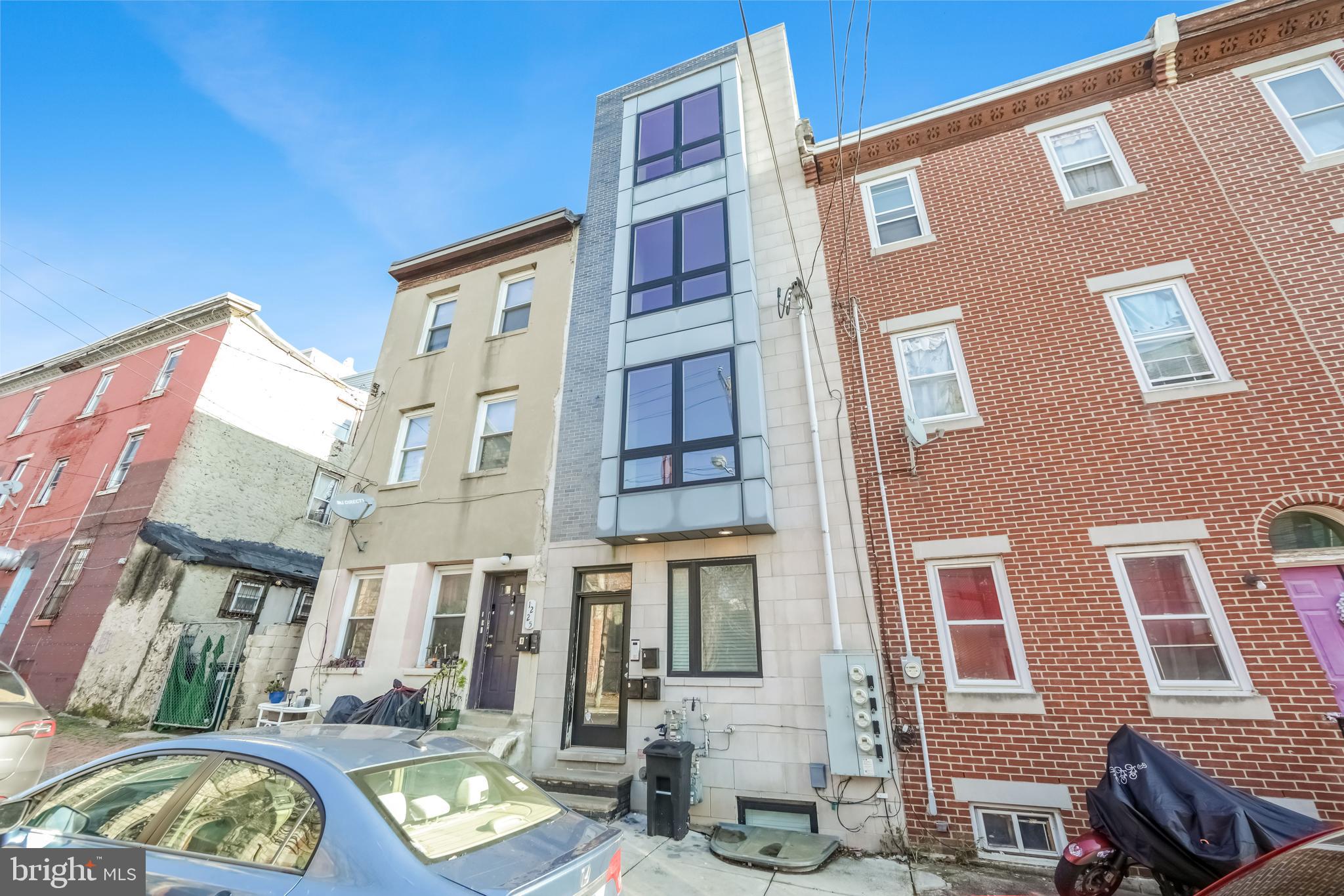 1223 N 25th st is a very well maintained 3 unit Multi-family building with about 4 years in full Tax abatement, comprised of : Unit A: Rented for $1,727/Month , very large bi-level 2bed/2bath, with an open layout spacious living space, en-suite master bed/bath and a very large private bakyard.
Unit B: Rented for $1,380/M , 1bed/1bath with open floor plan and a private balcony.
Unit C: Rented for $1,989/M, 2bed/2bath, bi-level with open floor plan, 2 balconies, an en-suite master and a private large roof-deck. Total rent is $5,096 per month. All 3 units are very large and well maintained.
This incredible, income-producing property is a newer built, low maintenance, surrounded by other new construction buildings and sits on a great and primce block in Brewerytown area, just one block away from college ave and all the restaurants on Girard ave and fairmount area. This investment is ready to provide years and years of steady revenue with potential for more rent increase and value appreciation. This building is currently set up as 3 separate condos which you can sell some and keep others if you wanted to. Also  listed and for sale is 12250 N 25th st. Act fast, priced to sell.