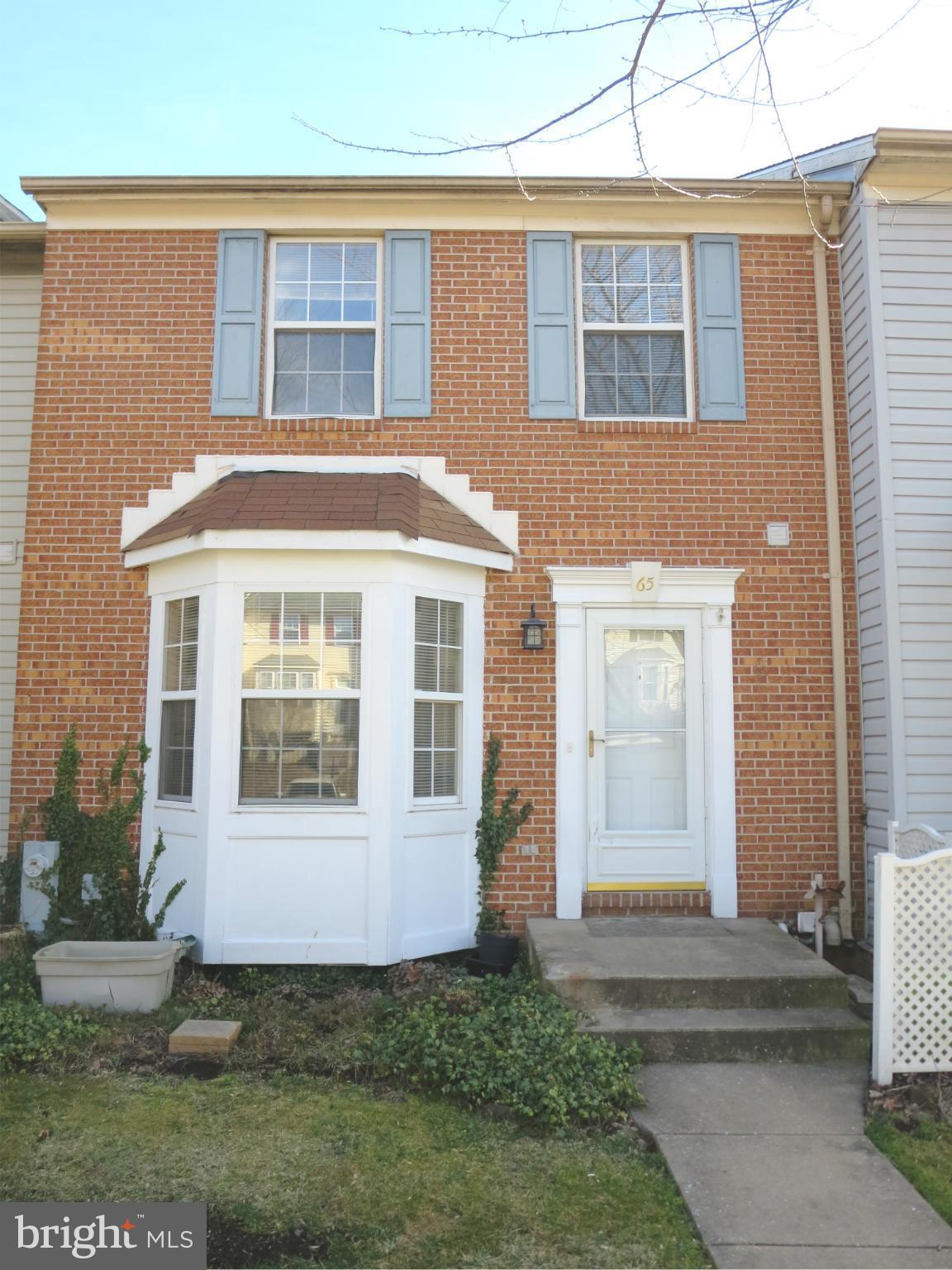 *Bargain priced unit perfect for a value oriented buyer or investor*  This brickfront townhome in lovely Oakhurst has nice curb appeal but needs TLC. Fix it up and make it your own and have instant equity as some similar townhomes in this desirable community are selling in the $220's. As an added feature, the walkout basement is already roughed in and studded for another bathroom. Don't delay!!!