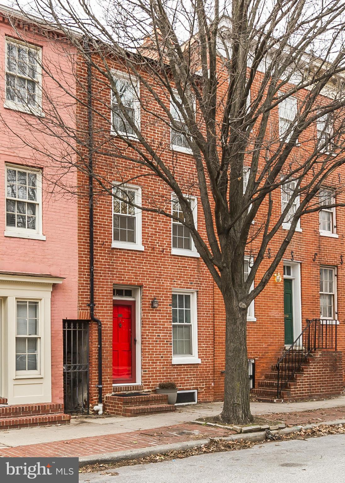 Charming Otterbein home with 2 fireplaces! Stainless & Granite in kitchen, private brick patio & garden, 2nd floor deck, exposed brick with spatially clever built-ins & cabinets, heated slate floors in kitchen! Conveniently located with regard to Stadiums, Harbor, Restaurants, Fed Hill!