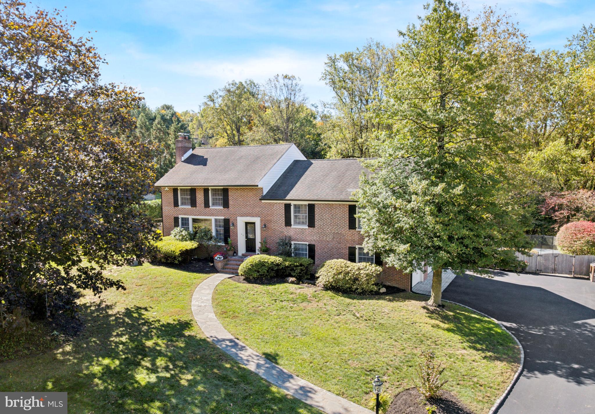 Welcome to 1726 Riverview Road — a spacious and distinctive split-level oasis tucked within a quiet Gladwyne cul-de-sac, offering exceptional privacy and a natural connection to the outdoors. With over 4,500 square feet of beautifully designed living space across multiple levels, this home combines classic Main Line comfort with modern updates and a flexible layout that adapts effortlessly to everyday life.

A bright, open layout connects the main living spaces — including a large family room with bay window, a formal dining room, and an inviting eat-in kitchen appointed with granite countertops and professional-grade Viking and Sub-Zero stainless steel appliances. The adjoining breakfast area opens to the expansive wraparound rear deck overlooking the pool. The home’s natural flow supports both everyday living and easy entertaining. The fully finished lower level offers generous additional space for recreation, guests, or a home gym, along with a spacious laundry room and interior access to the two-car garage. 

Upstairs, the primary suite features generous proportions, a walk-in closet with distinct his-and-her sections, and a private bath. Five additional bedrooms on separate levels provide exceptional flexibility for family, guests, offices, or playrooms. The fenced rear yard centers around a beautifully updated in-ground pool — showcasing new tile, motor, and filter — surrounded by lush landscaping and a recently installed child-safety fence. A private outdoor retreat, perfect for both relaxation and entertaining.

Since 2020, the property has undergone extensive mechanical, electrical, and exterior upgrades — including recessed lighting throughout, new siding with matching soffits, fascia, and gutters, all backed by a 50-year transferable warranty; brand new high-efficiency propane boiler and HVAC systems; and a fully repaved driveway with Belgian Block aprons at each end and a matching border along the sides. These premium upgrades deliver lasting performance and complete peace of mind.

Located in the award-winning Lower Merion School District, just minutes from Gladwyne Village, rapid access to I-76, commuter routes, and scenic river trails, 1726 Riverview Road delivers space, privacy, and enduring quality in a serene cul-de-sac setting.