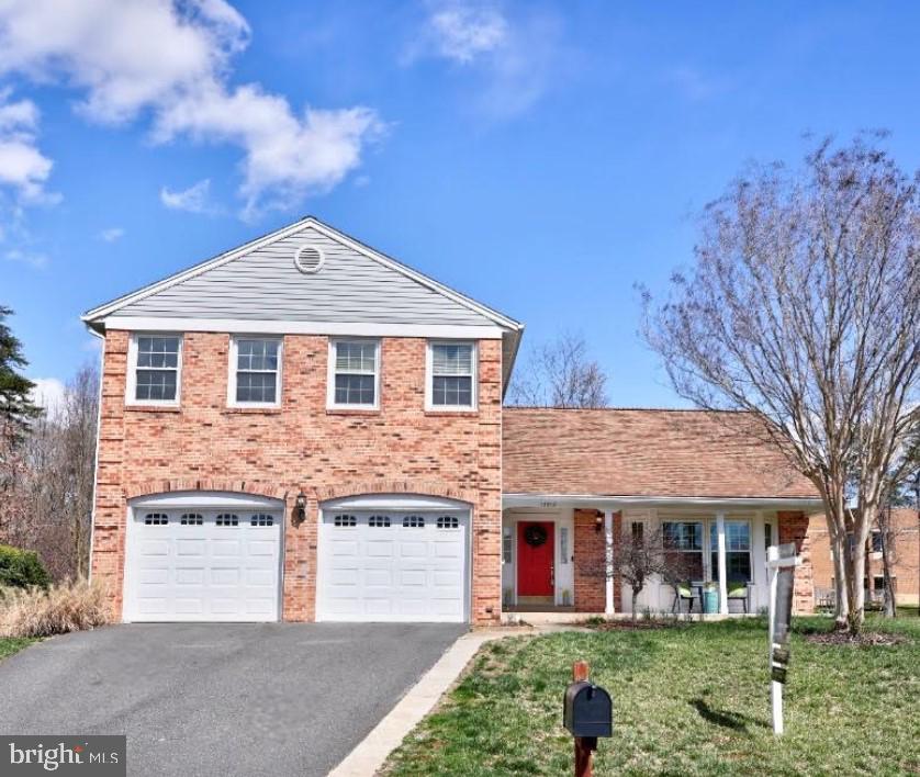 Welcome home! This charming brick single-family home nestled in the heart of Chantilly, Virginia in the sought after neighborhood of Poplar Tree Estates, known for its well-maintained surroundings and friendly neighbors is a modern, luxurious residence. Offering an inviting front porch, 4 bedrooms, 2 dens, 3.5 bathrooms, a large recreation room and 3 finished levels of living space, this home provides room for comfort, entertaining and versatility. 

With a large lot of over 10,000 square feet, you’ll enter and will be greeted by a welcoming foyer that leads to a bright and airy living room with a bay window, which flows into the formal dining room carrying you into the well-appointed gourmet kitchen complete with modern appliances, tile backsplash, ample cabinetry, a breakfast nook, slate floors and a feature slate accent wall. With perfect sight lines from the kitchen into the open comfortable family room enjoy cozying up by the brick wood-burning fireplace surrounded with built-in bookcases. Additional quality features include hardwood floors, crown molding, chair railing, ceiling fans, an updated main level guest bath, a laundry room on the main floor with an LG washer and dryer, a storage room, hot water heater replaced in 2023 and more. 

A rare quality feature is the spacious screened-in porch with vaulted ceilings expanding the space to entertain and relax, an expansive deck with a hot tub surrounded by trees and a spacious, private backyard that faces a beautiful wooded area, perfect for outdoor activities and gardening enthusiasts. The attached two-car garage offers ample storage with built-in shelving, cabinets and parking.  HOA amenities include a community pool and tennis courts for more outdoor activities.

The upper level houses four generously-sized bedrooms and two full bathrooms. The primary suite serves as a private retreat, complete with an en-suite spa-like bathroom featuring ceramic tile floors and walls, a frameless glass shower and an updated vanity, mirror and lighting. 

 Conveniently located, residents have easy access to local amenities, including shopping centers, restaurants, and recreational facilities. Major highways are nearby, facilitating easy commutes to surrounding areas.  Also included: easy access to the scenic Big Rocky Trail, located just behind the house, perfect for walking a dog or jogging. 13512 Granite Rock Dr. offers a blend of comfort, convenience, and community, making it an ideal choice for those seeking a welcoming home.  Schedule your tour today!