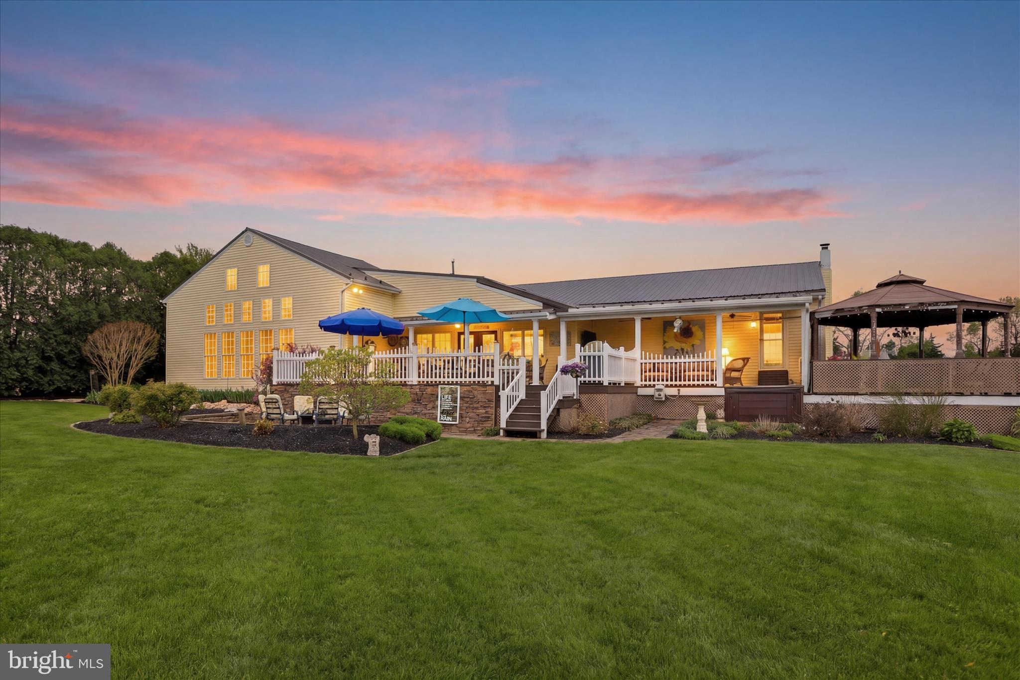 This beautifully maintained 3-bedroom, 2-bath home sits on a generous 0.49-acre lot and offers exceptional indoor and outdoor living.

Step outside and you’ll find an impressive array of features designed for relaxation and entertaining, including a 10x26 covered rear porch, a second 12x26 covered porch, a 10x26 uncovered deck, and a spacious 22x32 deck complete with a hardtop pavilion overlooking a serene fish pond. In addition, a 16x26 hardscaped patio provides yet another inviting space to enjoy the thoughtfully landscaped backyard and scenic views.

Inside, the home is just as impressive. A formal living room welcomes you and flows into an upgraded kitchen featuring stylish backsplash, custom Hess cabinetry, and hardwood flooring. Cooking enthusiasts will appreciate the two double ovens, a convection oven, two convertible refrigerators and an oversized walk-in pantry offering abundant storage and organization.

Just off the kitchen, step down into a bright and airy dining room filled with natural light from large windows and a French door that opens to the outdoor living areas—perfect for entertaining. Beyond the dining room is an expansive 24x32 family room with 12-foot ceilings and a dramatic 17.5-foot vaulted center, where abundant natural light and a cozy pellet stove create a warm, inviting atmosphere.

The home’s primary suite offers a spacious retreat, complete with a large walk-in closet and a private bath featuring ceramic tile, a walk-in-shower and a generously sized laundry area.   The home also includes two bedrooms and a second full bath. 

An oversized two-car garage offers ample storage and workspace, plus an additional 8x18 room ideal for hobbies or a workshop.

A 960-square-foot basement provides a flex space, workshop area or additional storage, complemented by two outdoor sheds for added convenience.

With numerous upgrades and unique features throughout, this property is truly a must-see.