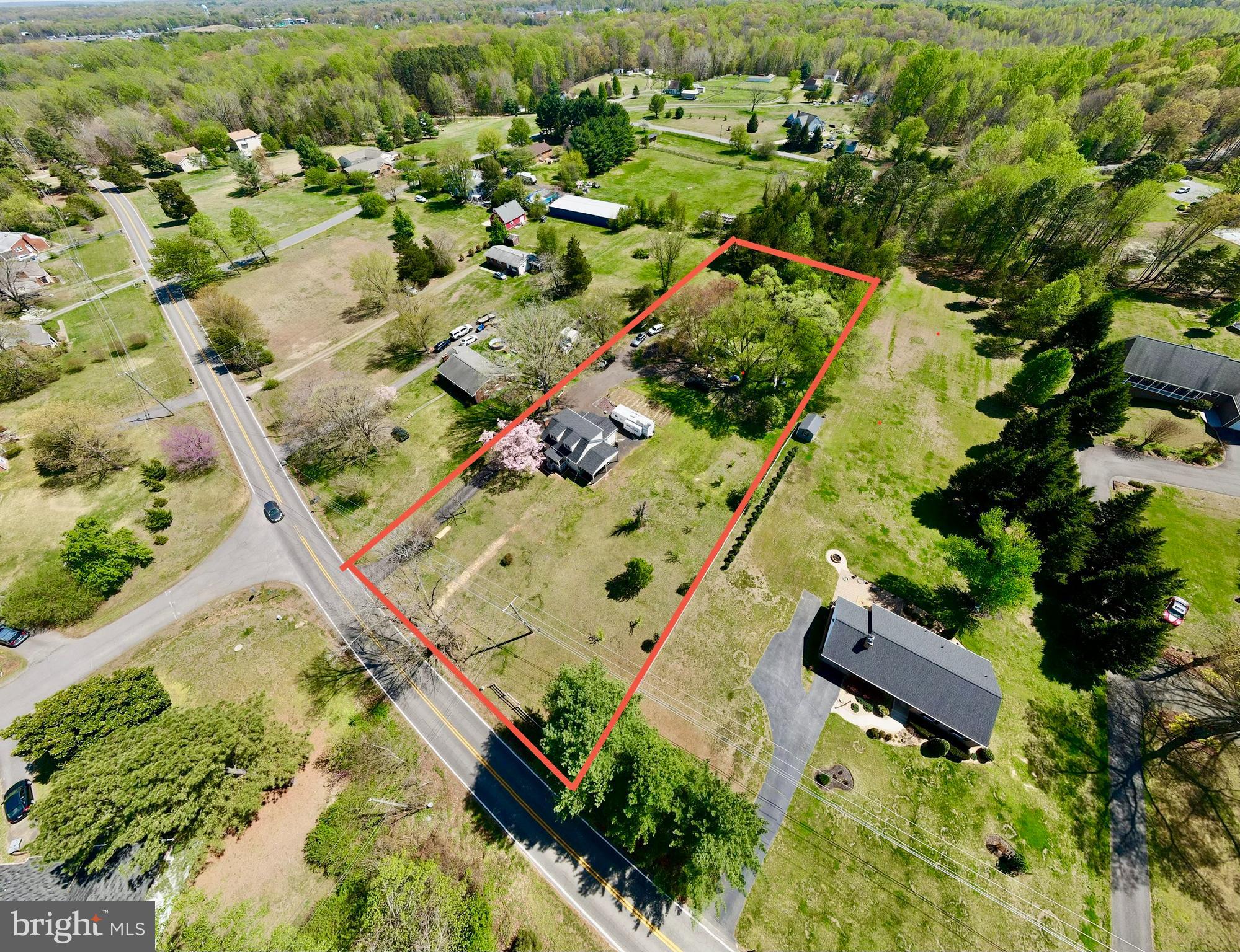 Perfect investment with very little use restrictions pertaining to Farm usage, ready to build 2nd Home, allowable by Zoning, county approved. Washer & Dryer in basement but 3rd floor connection rough in available. 

Lots of natural light. Zoning allows for 2nd Dwelling to be built due to Historic Designation with larger lot (Approval Document Available). Lots of Sweat Equity & Potential! Close to Rt. 17 Commerce, Amazon Warehouses & 2 mins away from i-95, 3 mins from Fishing Lake, 5 Mins from Downtown Fredericksburg, 10 mins from the Rappahanock River. & Kalahari Indoor Swimming Resort. 

Fully renovated 3 years ago, new carport, 2 porches, Long driveway, with circle in the back plus extra parking spaces. 1/3 of the lot towards the rear is wooded / trees with cleared trails, mostly flat lot.