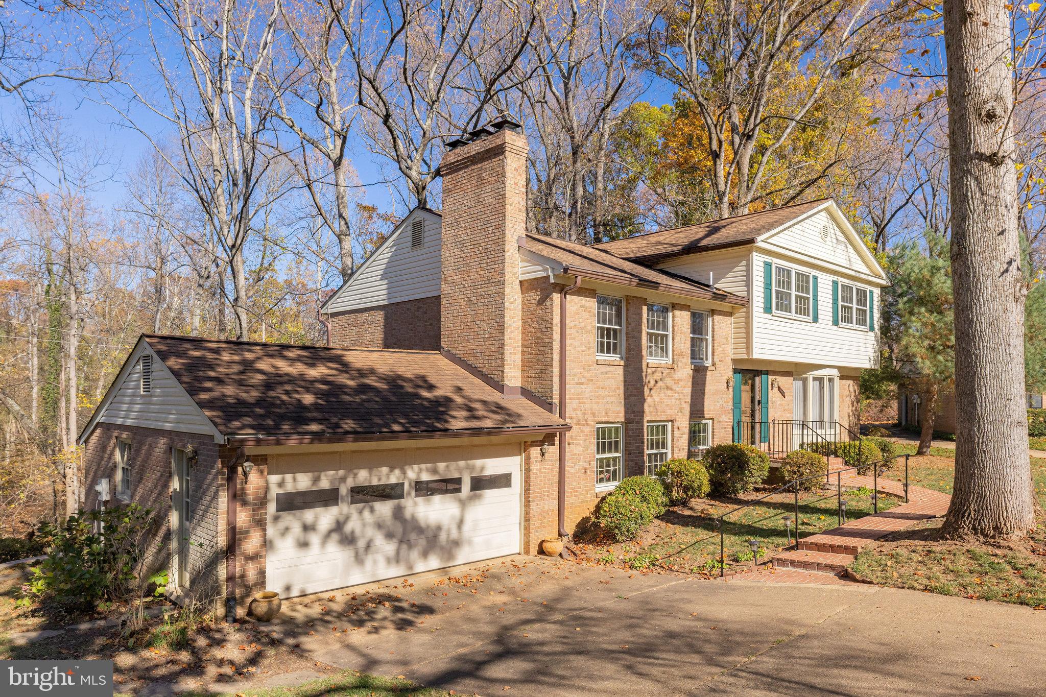 Welcome to the highly sought-after Forest Villa neighborhood! This stunning 5-bedroom, 5-level, 3.5-bath home, spanning approximately 3,400 square feet, offers a rare opportunity to live on a peaceful street with parkland and scenic trails right in your backyard.
Sunlight pours into the main level, highlighting the hardwood floors, spacious living room, formal dining room, and updated kitchen. The kitchen features stainless steel appliances, granite countertops, and a cozy breakfast area with serene treetop views — perfect for your morning coffee.
Step down one level to the impressive family room, complete with a gas fireplace, powder room, garage access, and sliding doors that open to the deck overlooking the park — ideal for entertaining or unwinding in nature.
Upstairs, the expansive primary suite is a private retreat, featuring a sitting area with a fireplace, walk-in closet, and ensuite bath with a walk-in shower. The top level boasts four additional bedrooms and a hall bath with a tub, offering ample space for family or guests.
The bright lower-level basement is a versatile space, perfect for a large office, game room, or hobby area. This level also includes a full bath, laundry room, and additional storage. Roof New 2018. HVAC, A/C and chimney liner new 2021. No HOA. 
Centrally located with an easy commute to DC, Arlington, Alexandria, Tysons, Reston, and both Dulles and Reagan airports. Just 10 minutes to the Metro and within the highly-rated McLean school pyramid — all schools are within a 2.5 mile radius. Enjoy nearby shopping and dining, including the newly transformed Chesterbrook Shopping Center with Call Your Mother bagel shop, South Block, RTR Pilates, Starbucks, and more. Convenient access to 495, 66, and the GW Parkway makes getting around a breeze. Don’t miss the chance to make this property your own!