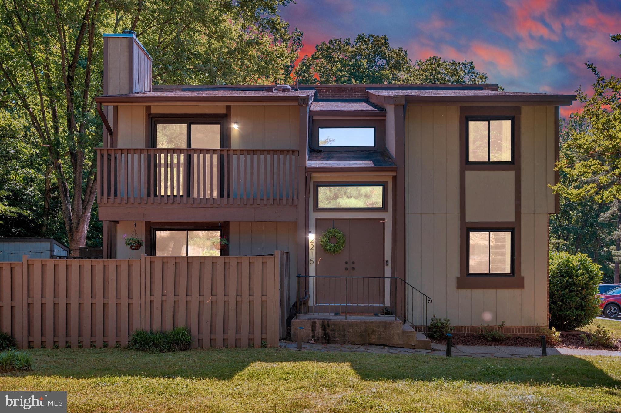 Welcome to 2215 Glencourse Lane, a beautifully updated end-unit townhome in the highly sought-after Glencourse community of Reston. Situated on a spacious corner lot with a fenced backyard, this exceptional three-level home offers the perfect combination of modern upgrades, abundant living space, and a serene park-like setting with all the conveniences of city living.
Ideally located just minutes from Reston Town Center, the Metro, Dulles International Airport, and major commuter routes, this home provides easy access to shopping, dining, entertainment, and employment centers.
The home has been thoughtfully upgraded throughout and is filled with natural light thanks to its end-unit location and numerous windows. The remodeled kitchen features stainless steel appliances, shaker-style cabinetry, Silestone countertops, a glass subway tile backsplash, an oversized sink, and a bright eat-in breakfast area.
The main level boasts upgraded porcelain tile flooring and a spacious family room centered around a cozy wood-burning fireplace, creating the perfect gathering space for family and friends. 
Upstairs, the spacious primary suite provides a private retreat with upgraded carpeting, walk-in closet, and a charming balcony overlooking the peaceful surroundings. The  primary bathroom has been extensively renovated and features floor-to-ceiling tile, a frameless glass shower enclosure, built-in bench seating.
The fully finished lower level adds even more living space and versatility. Enjoy a large recreation/family room complete with a wet bar, making it ideal for entertaining, movie nights, game days, or guest gatherings. The lower level also includes a half bath, laundry area, and generous storage space.
Step outside to your private fenced backyard featuring a patio perfect for outdoor dining, family barbecues, and entertaining. A storage shed provides additional convenience.
Living in Reston means access to an unparalleled lifestyle and recreational amenities. Residents enjoy miles of scenic walking and biking trails, beautiful man-made lakes, numerous tot lots and playgrounds, tennis and pickleball courts, swimming pools, parks, and the nearby Reston National Golf Course. 
This move-in-ready home combines exceptional upgrades and generous living space. Come see all that 2215 Glencourse Lane has to offer—you'll want to call it home.
