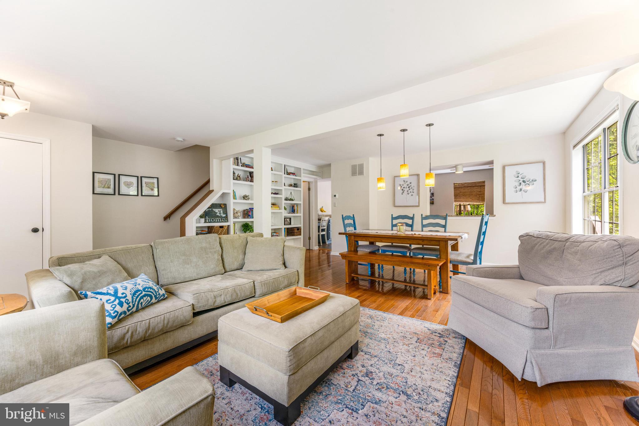 **Offer Deadline Sunday May 11th 5pm** Welcome to your charming end unit townhouse located in sought-after Ellicott City! Nestled at the end of a row, this inviting home features 3 generously sized bedrooms, 2.5 bathrooms and a walkout basement. As you enter the home you’ll be greeted with gleaming hardwood floors, a cozy living space with a wood burning fireplace, and a beautiful built-in bookshelf wall. Step into the kitchen where you will find granite countertops, stainless steel appliances, and an additional prep space or work space. An expansive deck off the kitchen offers private views and a side-staircase allowing you to descend to the ground level brick patio.  
The spacious owners suite features an ensuite bathroom, his and hers closets, and tons of natural light, creating a warm and welcoming atmosphere. Two more bedrooms and a full bathroom can be found on the upper level.
The fully finished basement can serve as additional living space, fourth bedroom or quiet working space equipped with its own half bath and access to the yard through the siding glass door. A separate utility room with washer/dryer and work bench can be found in the basement as well.
Conveniently located less than a mile from historic Old Ellicott City, as well as commuter routes, this home offers both convenience and charm.  Don't miss out on this fantastic opportunity to own a piece of Ellicott City living.