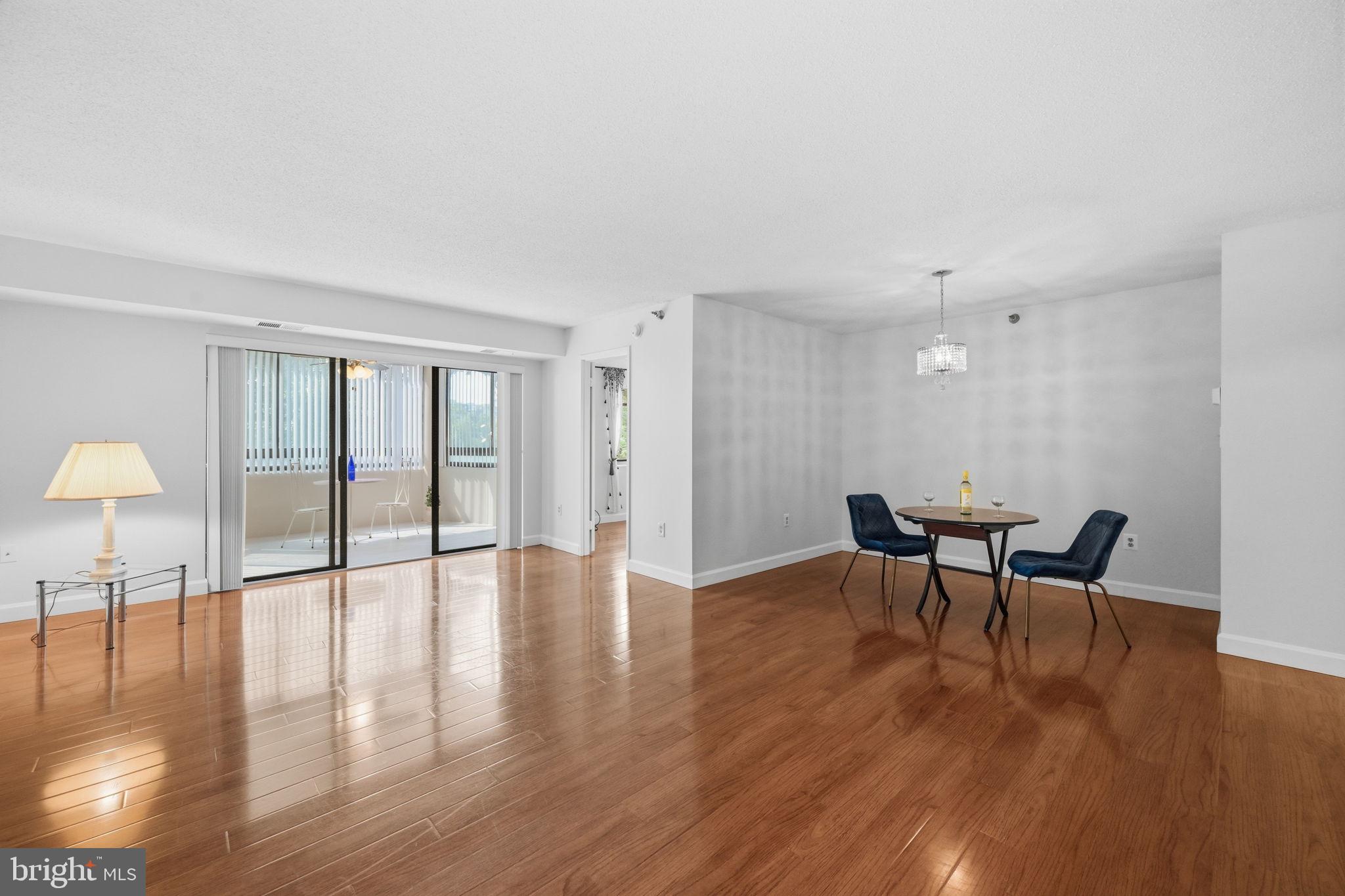 A RARE Beauty at Leisure World! - The dedicated 55+ living community. <br><br>

Exquisite 2-bedroom / 2-bath condo with Southeast Sunny exposures! Fully renovated in 2020 & just professionally painted, hardwood floors shined, cleaned and ready for the new owners! <br><br> Everything new in 2020 and gently used since then!  Kitchen & baths shine. Tons of closets. Kitchen has room for table - perfect for small meals. Stainless steel appliances & granite countertops ++ a tall pantry. <br><br>Living room is big and Dining Room area can accommodate large furniture. Owner's suite features a separate dressing room with double walk-in closets and a separate vanity area. Owner's bath features shower with sleek tilework. 2nd bedroom has large closets and another private stylish bath with tub. Stacked washer & dryer machines located in a laundry room that provides extra storage.  <br><br> Bonus Sunroom has a ceiling fan, ceramic tile flooring and updated window blinds to compliment the overall styling of the modern unit. 
<br><br>Unit 124 is ONE-LEVEL ABOVE the lobby - -not ground floor! Also nearby steps to rear building door for access to garden & woods -- perfect for walking a dog. One pet is permitted -- either cat or dog.<br><br>Easy living at the Greens II in a friendly building with many community activities. Unlimited Surface parking is included; underground parking can be rented separately.<br><br> Enjoy all the Leisure World amenities and lifestyle -- pool, gym, events, social clubs, golf!   All home purchases at Leisure World include a 3% reserve funds contribution fee + $350 membership transfer fee to be paid at settlement.
