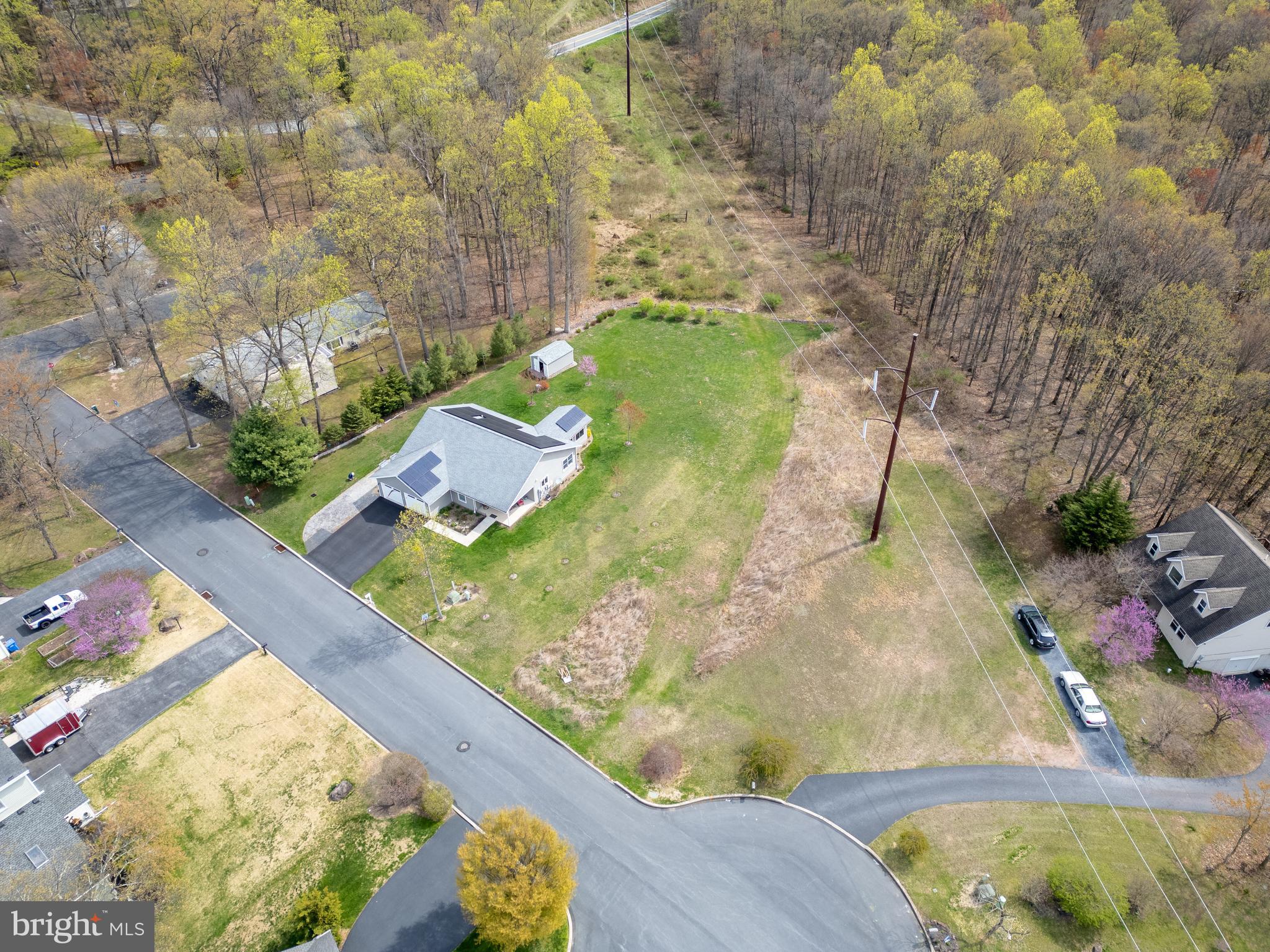 You'll definitely want to consider this beautiful .88  acre lot in the beautiful Colonial Woods neighborhood to build your new home! This West Shore School District property is right off Big Spring Rd. Not quite enough acreage?  There is another lot  that is 1 acres that connects to the back of this one that is also for sale. (Lot 101b Elder Trail)