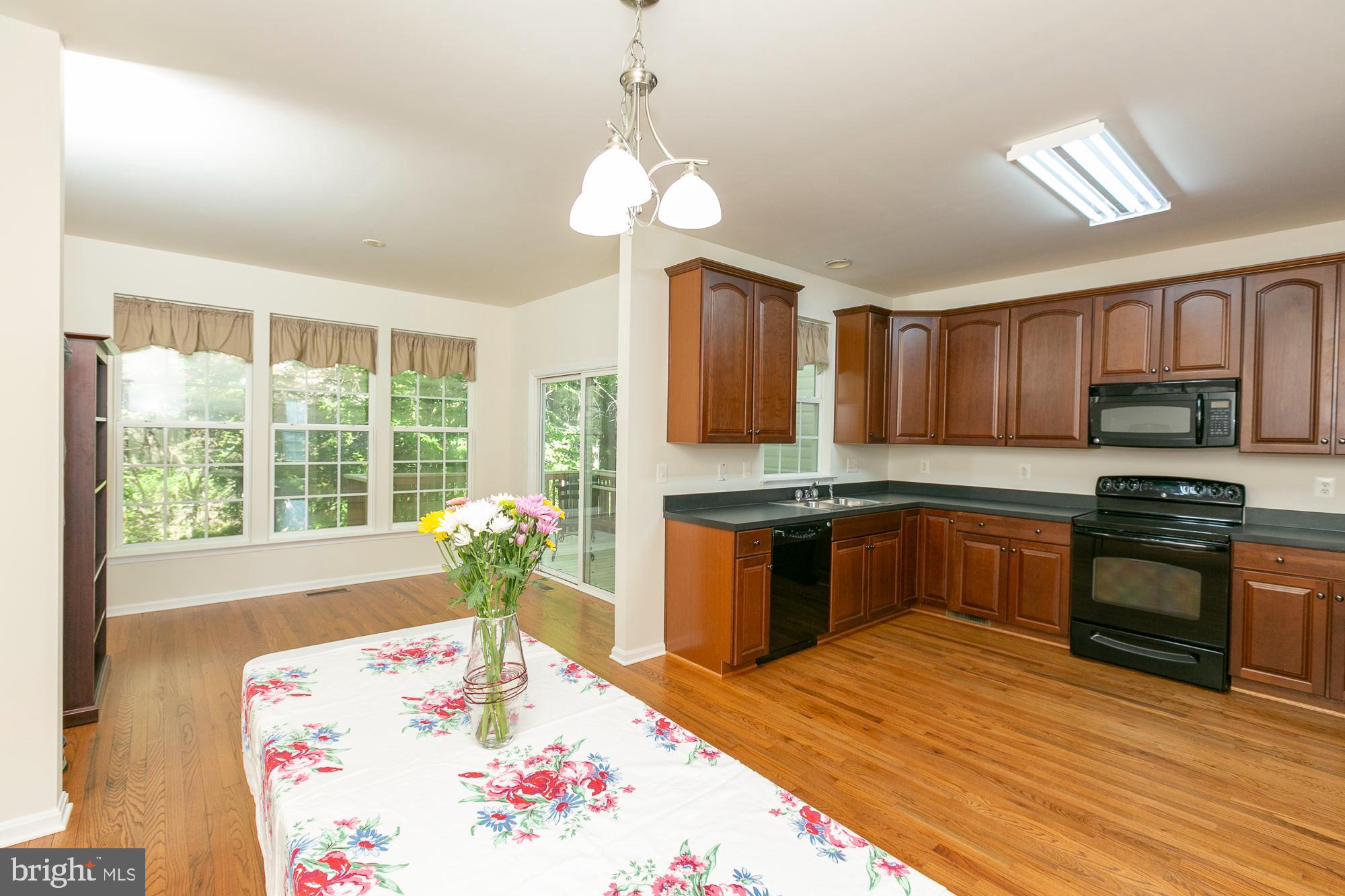 Welcome to this Sun-Drenched and Spacious Townhome with Brick Façade, Serene Wooded Views, 3 Bedrooms, 2 Full Bathrooms, and 2 Half Baths.  Recent updates include Refinished Hardwood Floors, Newly Installed Redefined Pine Floors, recent New Deck Floor Boards, and an almost new HVAC System that was installed in 2024.  Comcast cable and Xfinity are available.  Enjoy the perfect blend of town and country! This home is conveniently located near the new Shepherdstown Library, Morgan’s Grove Park, and the unique restaurants and shops of historic downtown Shepherdstown.  Your options for adventure are nearly endless, with the Potomac River, C&O Canal, Harpers Ferry, Charles Town, Martinsburg, the Appalachian Trail, and lots of Outdoor Recreation with MARC commuter and Amtrak passenger train stations in the area.  Visit https://shepherdstown.info/ for more information, to request the email newsletter, and to view the calendar of local events.