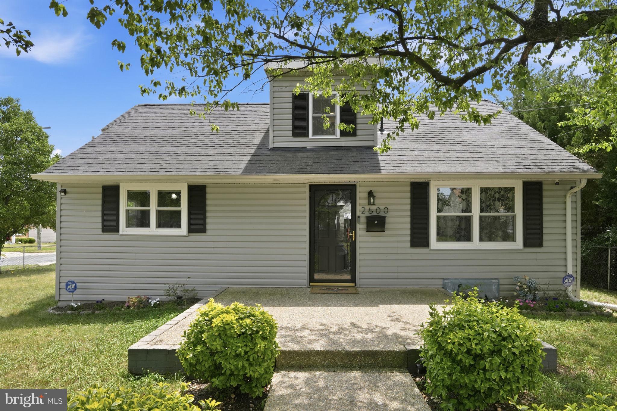 Welcome to 2600 Millvale Ave — your next address in the heart of North Forestville, one of Prince George's County's most conveniently located and steadily growing communities. This charming Cape Cod combines classic character with modern finishes that make it truly move-in ready.

Step inside and you're immediately greeted by an open-concept layout filled with natural light, recessed lighting, and a seamless flow from the living room straight into the kitchen. Whether you're hosting a crowd or keeping it low-key, this space was built for it.

The kitchen is the real showstopper — shaker cabinets, granite countertops, a classic subway tile backsplash, a deep farmhouse stainless steel sink, and a massive center island that doubles as a breakfast bar. All stainless steel appliances are included, and the adjacent mud/laundry room keeps everything organized and out of sight.

The main level offers three bedrooms and a full bathroom, including a spacious owner's bedroom tucked on the back wing of the home. Head upstairs to find two additional bedrooms and a second full bathroom — the perfect setup for guests, kids, or a home office.

Step outside and you'll find a spacious back porch right off the driveway — the ideal spot to wind down in the evenings, fire up the grill, or just enjoy the outdoors without leaving home. The fully fenced yard offers privacy, manicured landscaping, and a long driveway with parking for up to four cars, plus an attached two-car garage.

Location? Hard to beat. Situated inside the Beltway in District Heights, you're minutes from Washington, DC, with easy access to the Branch Avenue and Southern Avenue Metro stations. The area is close to Suitland Parkway, the Beltway (I-495/95), Ritchie Marlboro Road, and just a short drive to Joint Base Andrews. Nearby you'll find Walker Mill Regional Park, Suitland Community Park, Forestville Plaza, and a solid mix of local dining, grocery, and everyday conveniences. Whether you're commuting into the city or staying local, 2600 Millvale puts you right where you need to be.