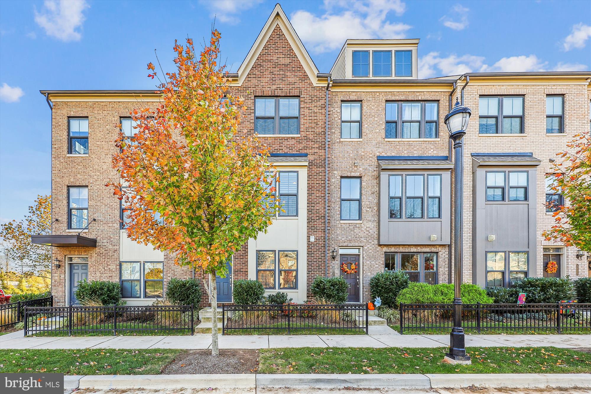 First time rental for this 6 year young Townhome in the wonderful community of Riverdale Park Station located within minutes from University of MD, College Park Metro & The Station Shopping Center.  This gorgeous 4 level townhome boasts 2 Bedrooms, 2.5 Bath,  loft, private Rooftop Deck a 2nd family room or office on the entry level plus an attached oversized 1 car garage.  Beautiful wood floors on the open floor paln main level,  gourmet Kitchen with quartz counters, a very expansive  island, 42" cabinets,  stainless steel appliances, and a tiled backsplash. The Family Room exits to a deck and a Dining Room with crown molding.   The next upper level consists of the Primary Bedroom with Private Bathroom, a Second Bedroom, Full Bathroom and a double sized linen closet.  Going up to the 4th level is a loft area that could be used as another bedroom and a rooftop deck. Check out this home, you will not be disappointed.