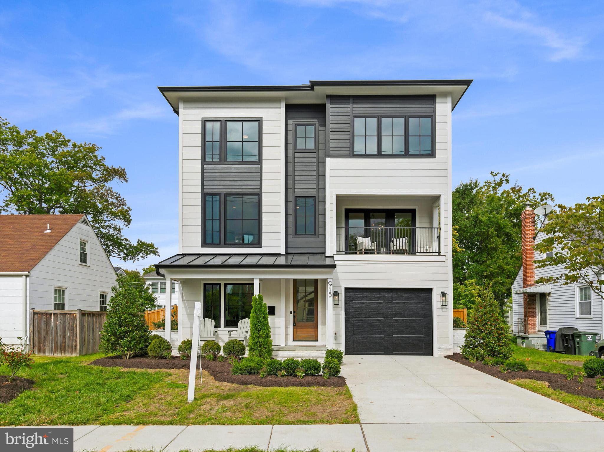 Welcome to Addison Heights, where luxury meets prime location near National Landing. This stunning 4-bedroom, 4.5-bath Classic Cottages design offers an inviting open-concept floor plan, perfect for modern living and entertaining.

Step outside to enjoy multiple outdoor spaces, including a charming screened porch, a cozy covered porch, and a spectacular rooftop deck, ideal for soaking in the vibrant surroundings.

The ground level boasts a tandem two-car garage, a convenient mudroom, and a versatile entry-level bedroom with a full bath and private entrance—perfect for guests or as a home office. You’ll also find an exercise room and a recreation room for your leisure activities.

On the main level, the generous office, elegant dining room with a butler's pantry, and spacious great room seamlessly blend functionality and style. The gourmet kitchen, equipped with JennAir appliances, is a chef’s dream. The upper level features a laundry room and two additional bedrooms, each with its own bath. The luxurious primary suite offers a large walk-in closet and a spa-like bathroom for your ultimate relaxation.

You are also conveniently located near the beautiful Metropolitan Park, where you can enjoy green spaces and community events.

Don’t miss the chance to call Addison Heights your home—where sophistication meets convenience in one of the most sought-after neighborhoods!