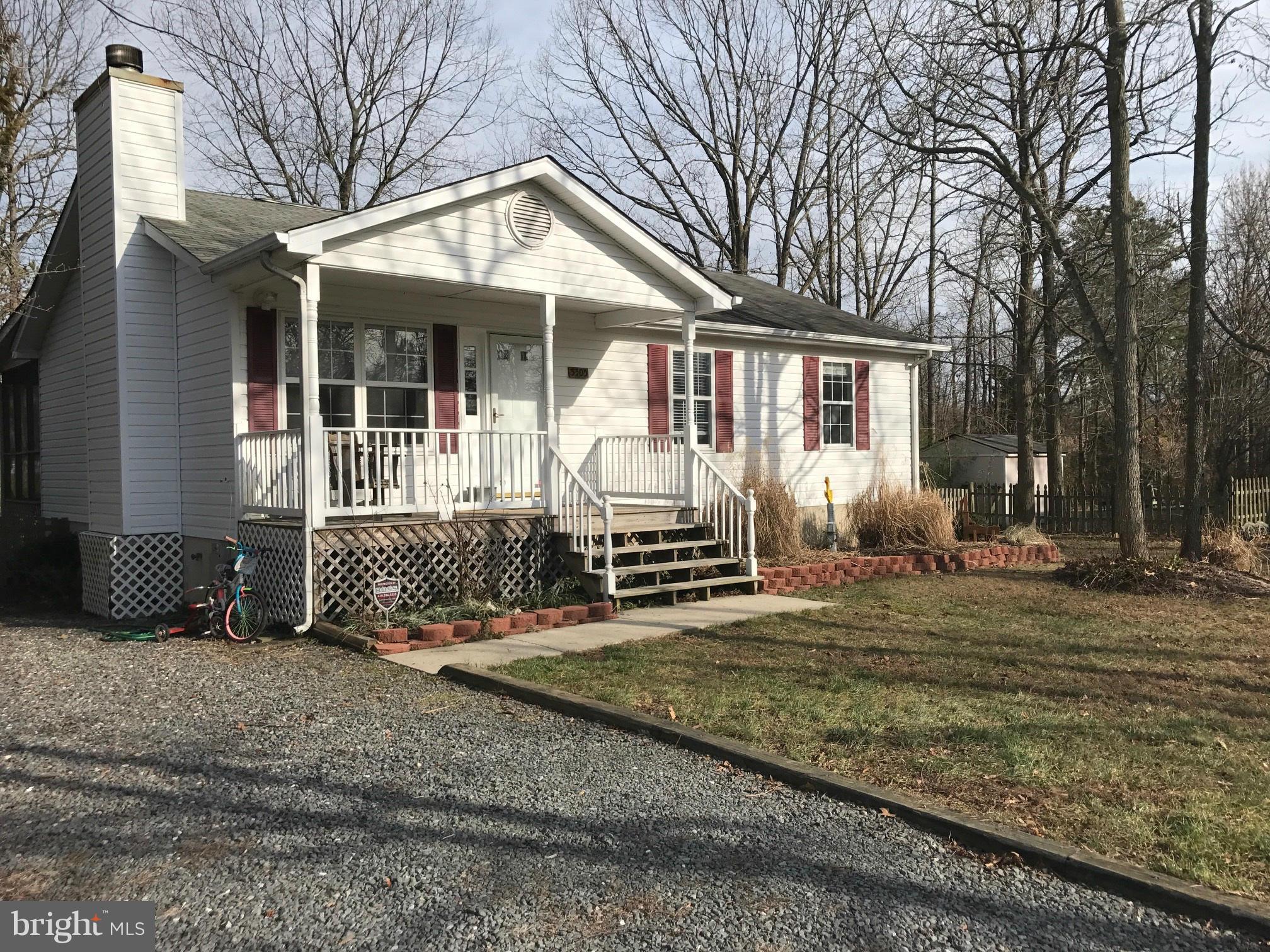 Private Cul-De-Sac, 3 bedroom, 2 bath Rancher with wood burning Fireplace** Screened in porch**New Stove and Refrigerator** Large yard that backs to open space with privacy!! Enjoy one level living, easy maintenance, excellent location!! Community Pier and Play Ground