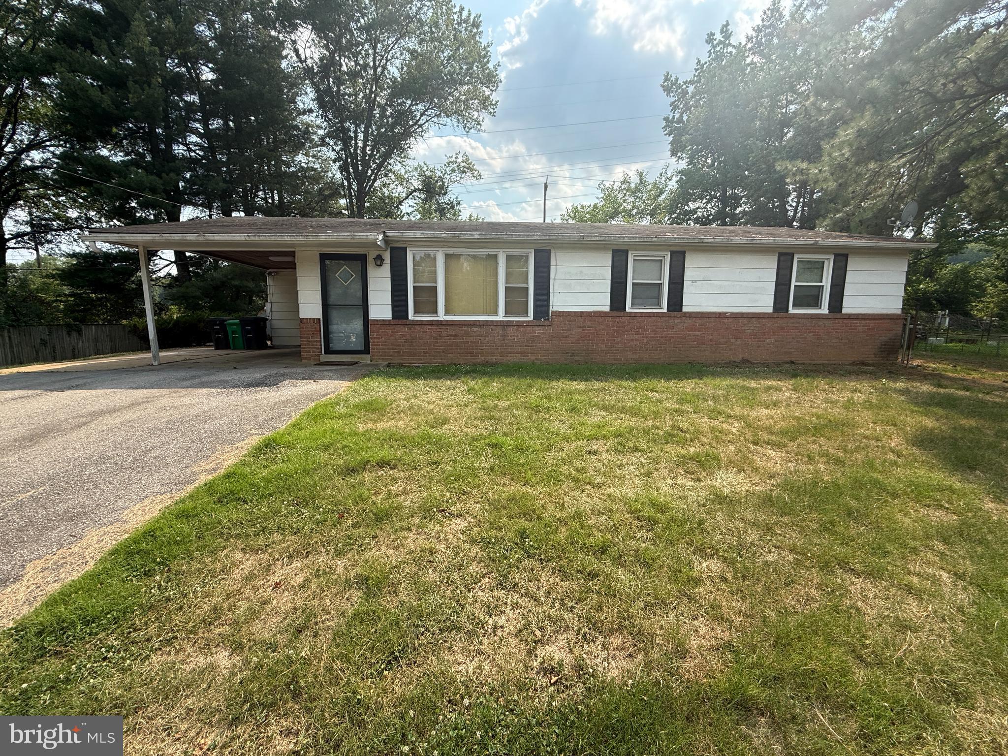 Opportunity awaits with this spacious 3-bedroom, 2-bath rambler situated on a generous lot. Offering the convenience of one-level living, the home features multiple living areas, a large family room with fireplace, separate dining area, functional kitchen, attached storage/workshop space, and an enclosed porch providing additional flexible space.

The property offers solid potential for renovation and personalization. While updates and repairs are needed, the home provides a great opportunity for investors, renovators, or owner-occupants looking to build equity. Conveniently located with easy access to shopping, dining, commuter routes, and everyday amenities.

Property is being sold strictly AS IS, WHERE IS. Seller will make no repairs or warranties of any kind. Buyer is responsible for conducting all desired inspections and verifying all property information. No offers will be considered during the first seven (7) days the property is listed. After the initial marketing period, all offers will be reviewed in accordance with the seller's offer review process.

Don't miss this opportunity to restore and make this property your own.