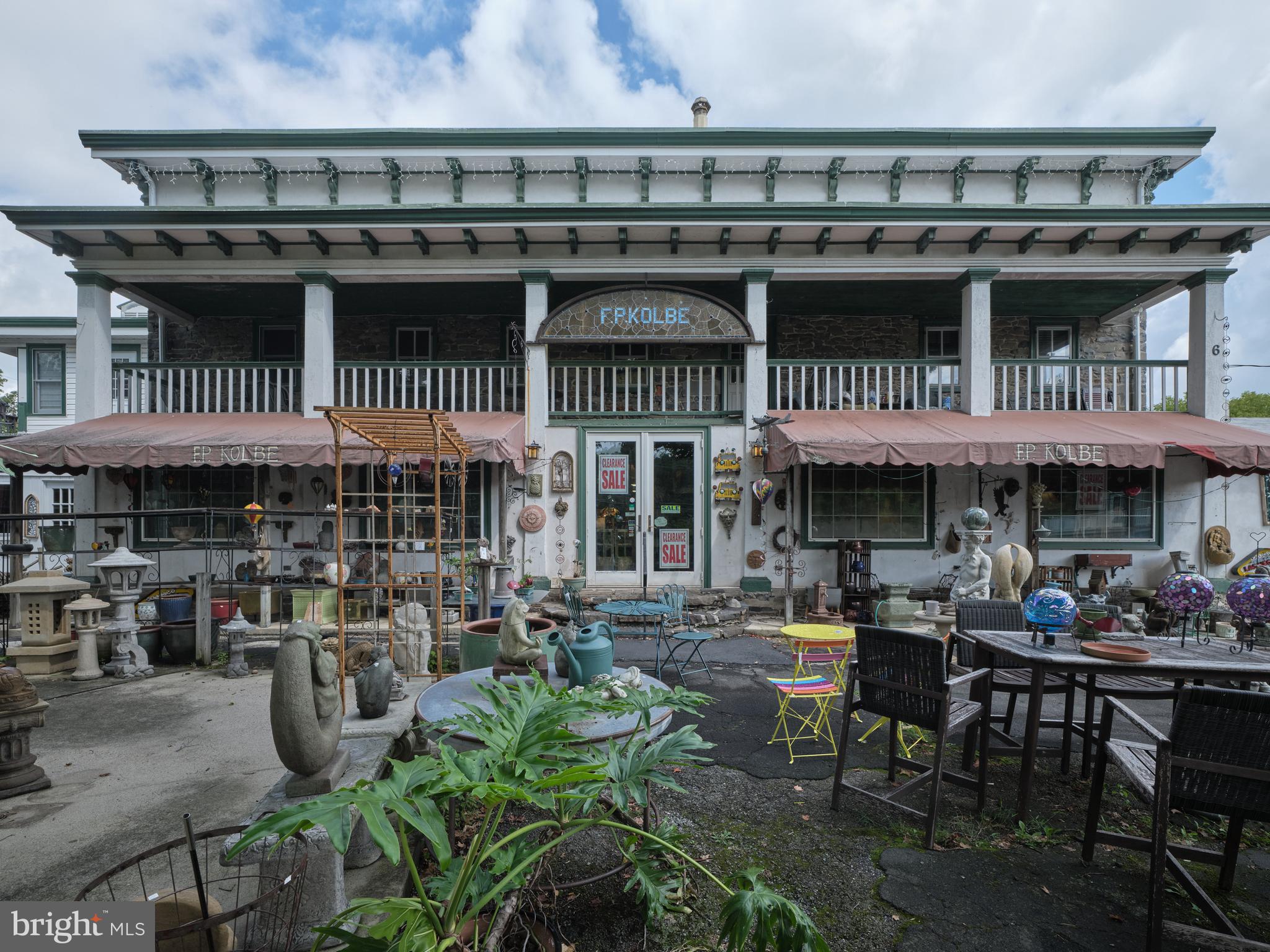 Sited along River Road in Point Pleasant is Kolbe's, previously Poor Richards, famous for its garden ornaments, furniture and a plethora of chachkas. This eclectic emporium was once the Central Hotel and Tavern, a busy stop along the country road between New York and Philadelphia.

The building, still embraces a great deal of the architectural aesthetics of the original hotel and tavern. This sprawling venue houses the large retail space, a cafe, a rental apartment and three additional rental units. There is parking for approximately 30 cars and has the potential to be a restaurant, retail, hotel, etc.

The Central Hotel is a historical gem that can be restored into a major focal point for tourism or for entrepreneurial endeavors. Its location is sited 15 minutes from Frenchtown and the I-78 corridor to New York, 20 minutes from New Hope, 25 minutes to Doylestown and 45 minutes to Princeton. This destination location is a rarity to become available and offers an exciting future with a historical foundation.

24 hours notice required.

Note:  The square footage of back building is 2400 square feet.  The front building 3 floors is approxiately  5800 square feet.  

Note also:  The apartment cannot be shown until the second showing.