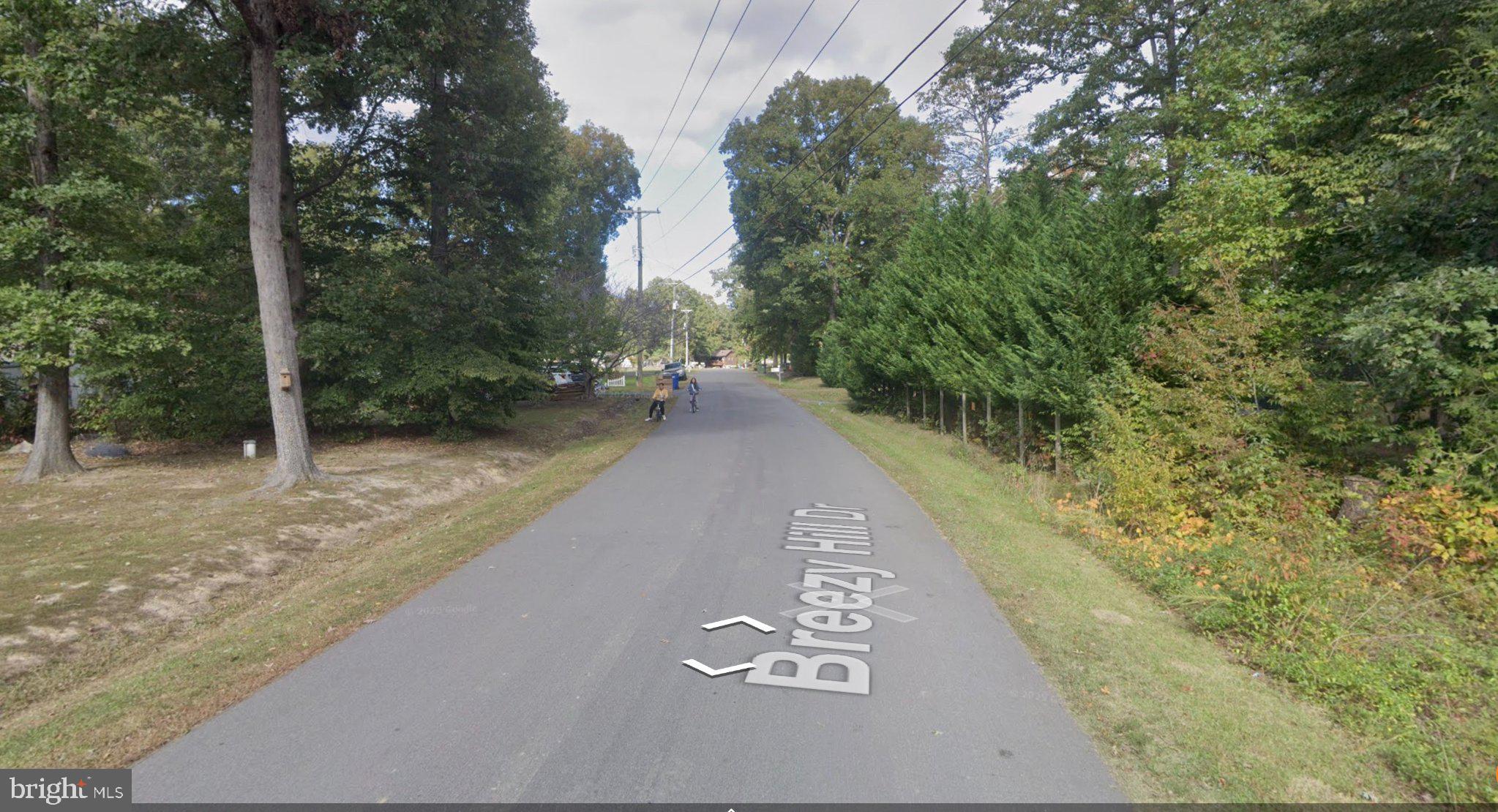 Opportunity to build dream homes on beautiful plot in desirable Lake Arrowhead neighborhood. These are 3 half acre lots that are already subdivided and ready to build. Buyer has option to purchase all 3 lots or individual lots. Health department permits approved and available upon request. Address in GPS is 55 Breezy Hill Dr. Don't miss out on your chance to secure this ready to be built land!