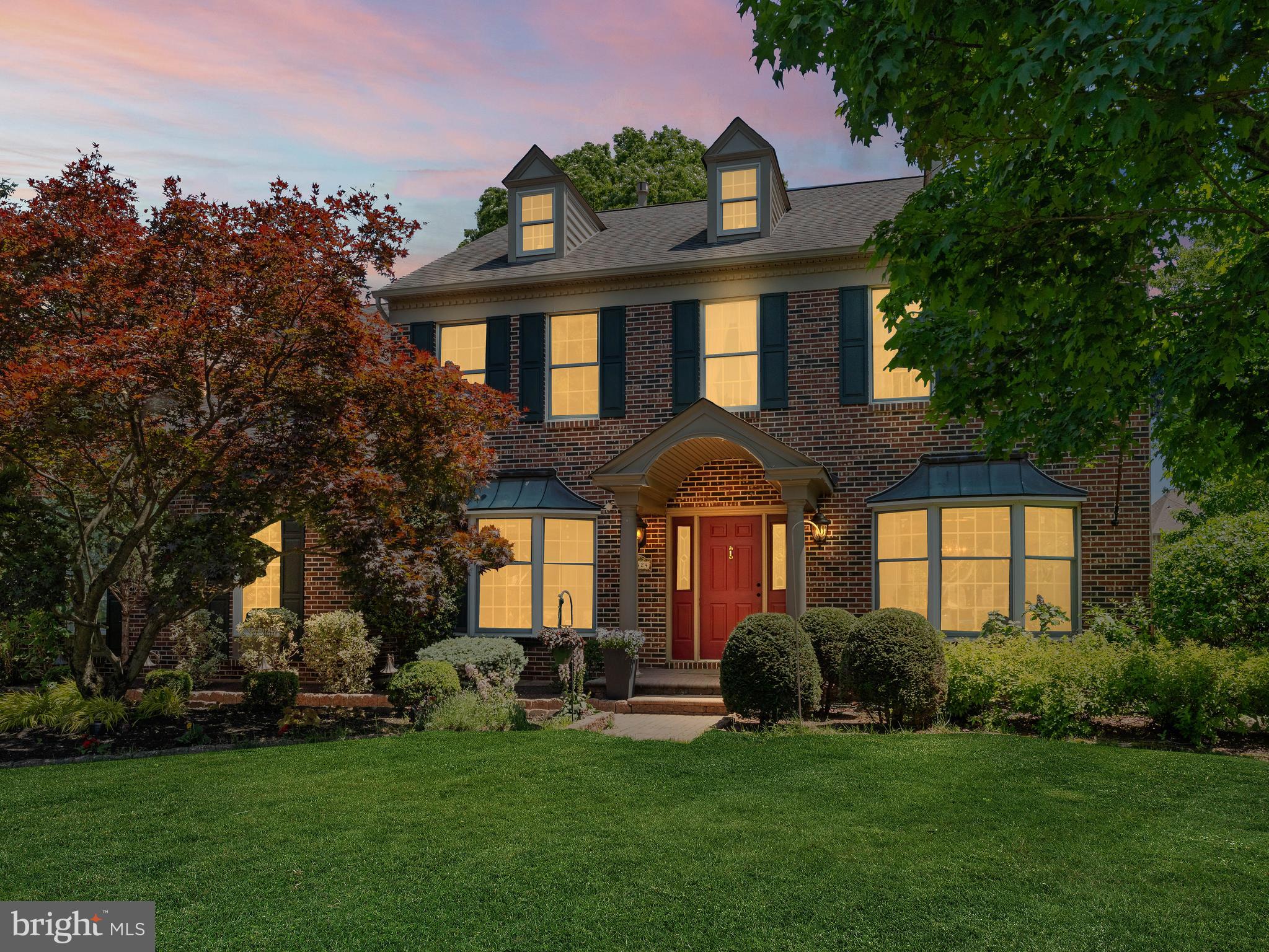Nestled in a quiet suburban neighborhood adjacent to open space and just minutes from the heart of Newtown Borough, this home combines thoughtful details and solid craftsmanship to create a lifestyle that feels both comfortable and refined. This four bedroom, two and a half bath residence welcomes you with a sense of warmth from the moment you arrive. A lush garden oasis frames the front yard, while custom cabinetry and fine millwork throughout the home showcase timeless character and quality craftsmanship & quality Andersen windows and doors. The primary suite serves as a peaceful retreat, complete with radiant heated floors in the ensuite bath.

Filled with natural light, the sunroom opens to a backyard setting that feels like your own private shaded park, where mature trees create a gentle canopy and sunlight filters softly through the leaves. An elevated composite deck extends the living space outdoors, offering the perfect setting to relax and enjoy the tranquil surroundings throughout the seasons.

The walkout basement features a dedicated workshop area, while the two car garage is finished with durable epoxy flooring. Thoughtfully updated mechanical systems, including multi zone heating and air conditioning, water softening systems, and an AprilAire whole home air quality system, add an additional layer of comfort, efficiency, and everyday ease to this exceptional home.