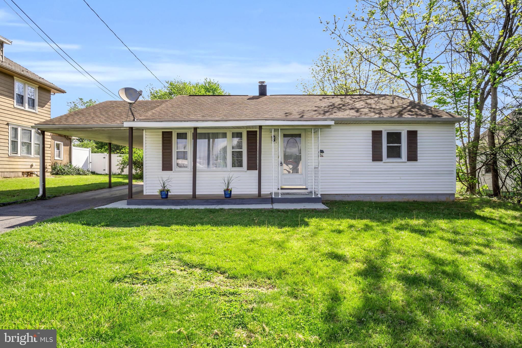 Welcome to your dream starter home in the highly sought-after South Middleton School District! This turn-key 3-bedroom ranch is perfect for first-time homebuyers seeking comfort, style, and convenience.   This home offers a large carport and huge concrete pad outside for parking, turn arounds, and doubles as a patio for outdoor entertainment.  The large backyard offers endless possibilities and privacy.   Step inside to discover gleaming hardwood floors and expansive living spaces filled with natural light. The modern kitchen boasts crisp white cabinets, sleek stainless steel appliances, and a spacious eat-in area ideal for family meals or entertaining.  Move-in ready and brimming with charm, this home is your gateway to homeownership.