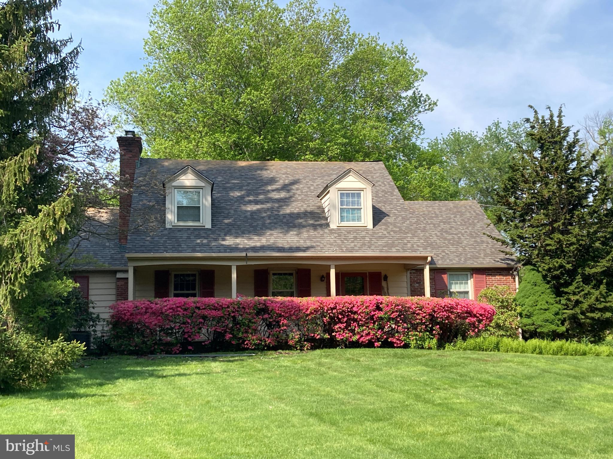 Don't miss this charming rental opportunity in the highly sought-after Pebble Hill neighborhood of Doylestown! This beautifully maintained 5 bed, 2.5 bath home, built by local craftsman Bill Graham, sits on a serene 1.5 acre corner lot, offering a perfect blend of convenience and tranquility. Enjoy the many unique appointments, rich with the history of Doylestown! The stunning kitchen island top, crafted from the reclaimed bowling alley lanes of the former Moose Lodge, perfectly paired with the basement mahogany bar from the Moose itself, brings a one-of-a-kind local charm to the space. The kitchen also features corian countertops, birch cabinets, and a dumbwaiter servicing the basement! A spacious dining room and grand living room, both with expertly crafted built-ins, along with a cozy family room connecting to the kitchen make this home perfect for entertaining, or for enjoying quiet nights in - surrounded by character and warmth. A luxurious first-floor primary suite features a newly renovated ensuite bathroom and a stylish dressing room with closet storage. Upstairs, you'll find four generously sized bedrooms and a brand-new full bath. The lower level offers a spacious and versatile flex area with direct walkout access to a charming covered porch, perfect for indoor-outdoor living.  Located just minutes from historic Doylestown Borough, top-rated Central Bucks schools, shops, dining, and major commuter routes. Photos feature furniture from the previous tenant; the home is now vacant and ready for move-in. Tenant responsible for utilities, lawn care, snow removal, trash. Available May 1st.