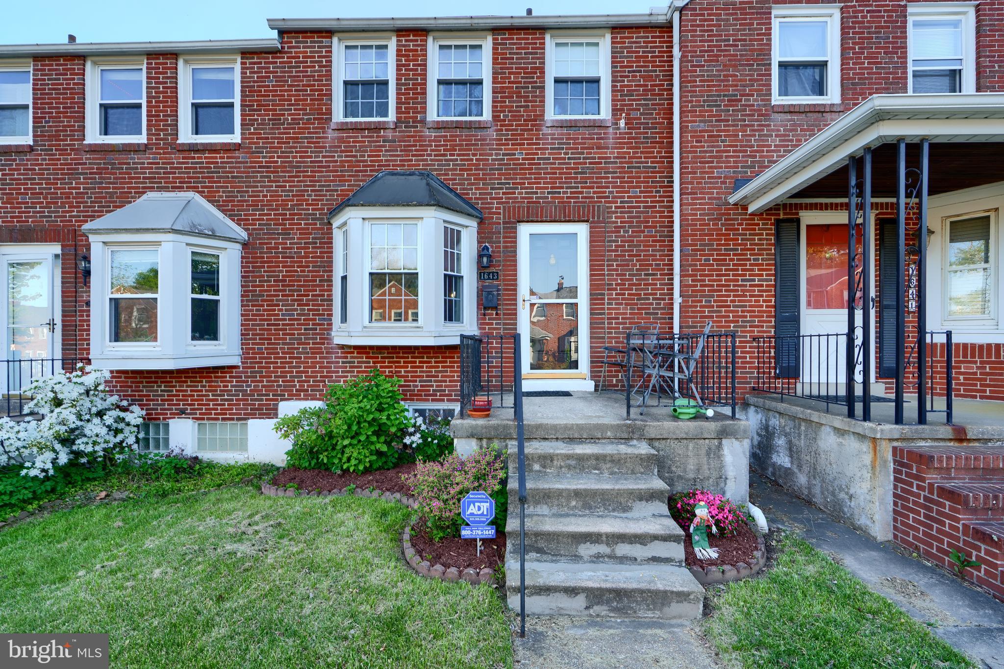 So many features make this 3 bedroom home extra special- private parking pad in the rear, sunroom addition from the kitchen, + deck, hardwood floors, finished clubroom, main level kitchen, living room & spacious dining room.