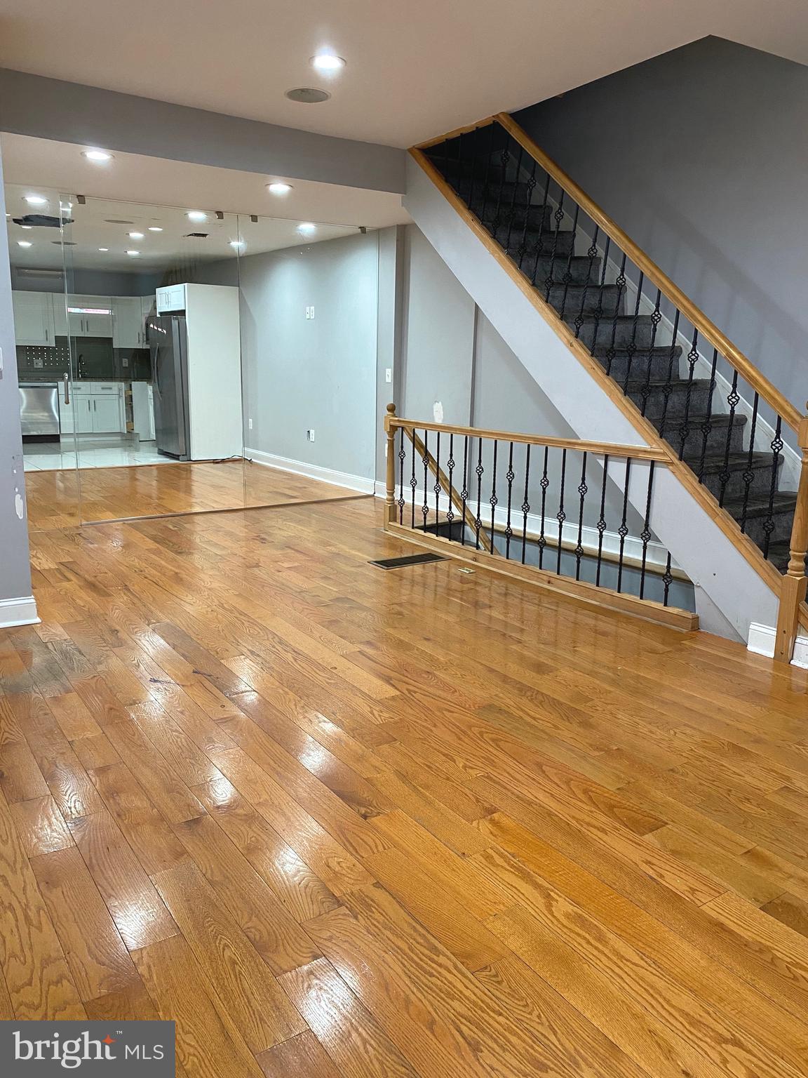 Welcome to the Heart of  Brewerytown! Walk into the Open Layout with Hardwood Flooring, Beautiful Modern Iron Railings,  spacious  Living and Dining Areas, and updated recessed lighting throughout. The kitchen has white shaker cabinetry, granite countertops, and a Stainless Undermount Sink. There is a Powder room on the main level. The Upstairs Consists of Three Ample Bedrooms, an additional Den/Office with a window which can be used as a Fourth Bedroom, and Two Full Bathrooms! There is a rear deck with spiral staircase leading up to the astonishing roof top deck with City Views! Large Tile Finished Basement. There is a sizeable Patio in the rear off the kitchen /laundry area, this is another great space for entertaining!  Dual Zone HVAC system and Wall Mount TV hook ups throughout. Property is Being Sold in "AS-IS WHERE-IS" condition. Some repairs are needed.  Seller makes no guarantees or warranties regarding condition of the property. Buyer responsible for Property Sales Cert.