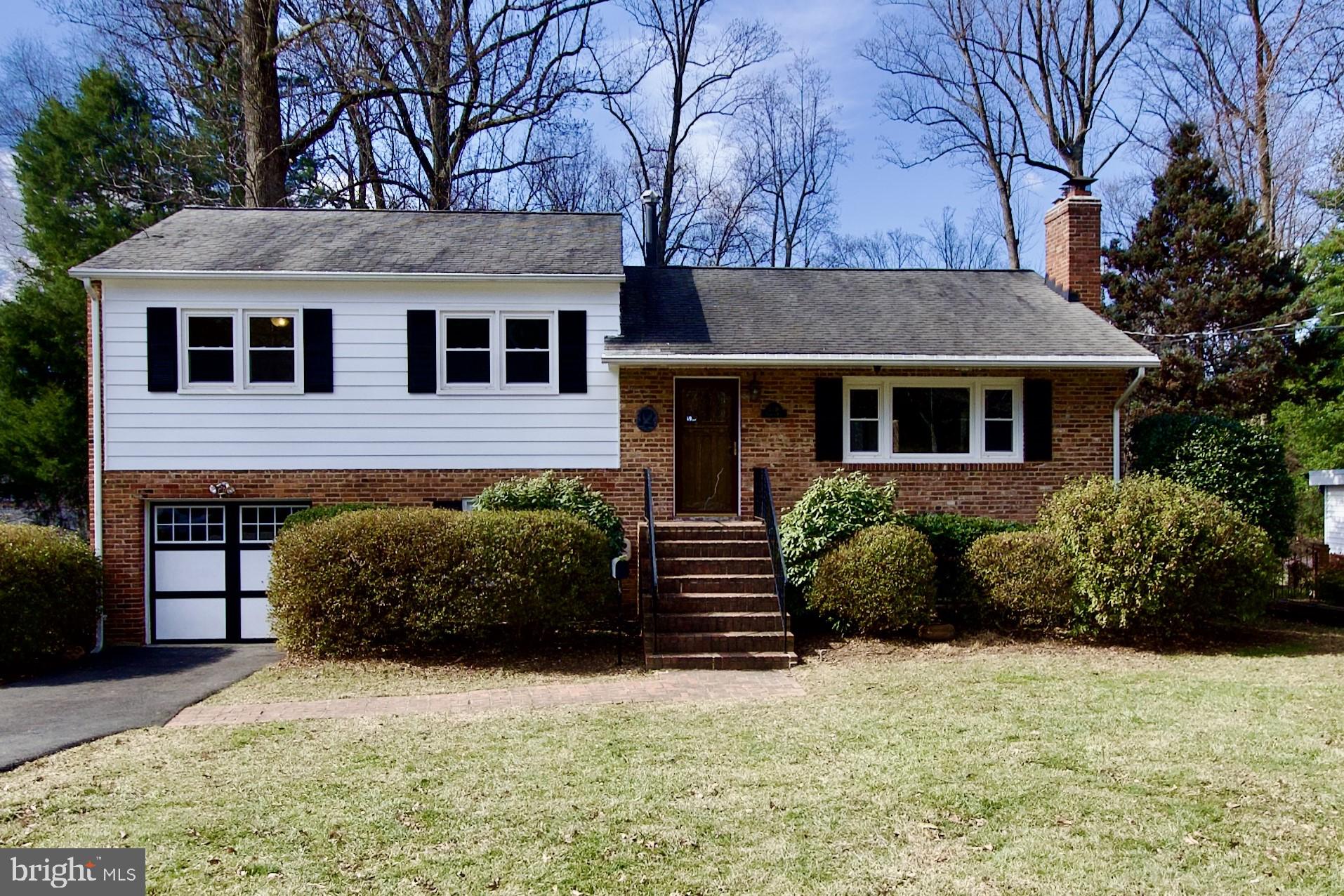 Welcome to your dream home in Falls Church! This stunning property boasts a main level open floor plan with beautiful hardwood floors and an abundance of natural light flooding in through the large windows. The spacious bedrooms offer plenty of room for relaxation and comfort. Cozy up by the fireplace in the living room on chilly evenings, or head downstairs to the large recreation room complete with another fireplace and wet bar - perfect for entertaining guests or enjoying a quiet night in. Step outside to the expansive outdoor space, ideal for hosting summer barbecues or simply enjoying the fresh air.  Both upstairs bathrooms were recently renovated and the main level and exterior were just painted.  The exceptionally large yard is beautifully landscaped and is stunning when all the plants are in bloom.  This home truly has it all - from the luxurious amenities to the convenient location in Falls Church.  Easy access to major commuting routes, WFC Metro, shopping and restaurants.  No HOA.  Don't wait!