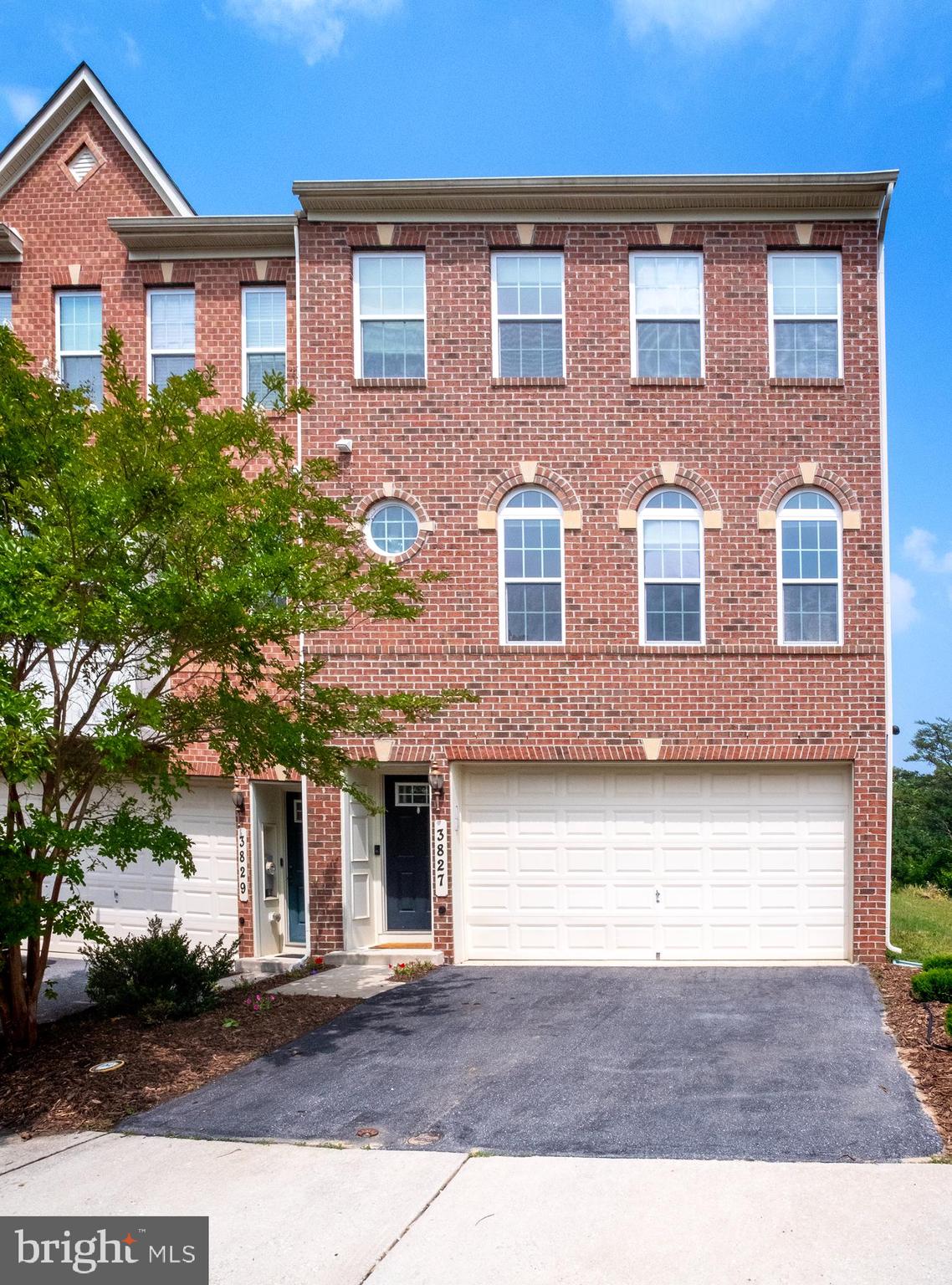 Fantastic Find! End-of-group and one of the largest homes in the neighborhood, this beautiful townhouse in Fairwood Crossing offers exceptional space with bump-outs that provide even more room to enjoy. The gourmet kitchen features granite countertops, stainless steel appliances, gas cooking, a large pantry, custom backsplash, and a spacious island overlooking the morning room, dining area, and living room—perfect for entertaining. The open floor plan is filled with natural light and highlighted by 9+ ft ceilings and two cozy fireplaces—one on the main level and another in the finished walkout basement. Upstairs, the oversized primary suite offers two walk-in closets and a beautiful en-suite bath. Additional features include two secondary bedrooms, 2.5 baths, a finished garage, and a Google Nest Thermostat. Leased solar panels help keep electric costs very low. Step outside to relax on your private deck overlooking a peaceful wooded conservation area and pond, or enjoy the beautiful backyard with serene wooded views. Lawn maintenance is included for added convenience. Ideally located between Baltimore and Washington with less than a minute to U.S. Route 29, plus easy access to shopping, dining, and entertainment—this home truly has it all. You won’t want to miss it!